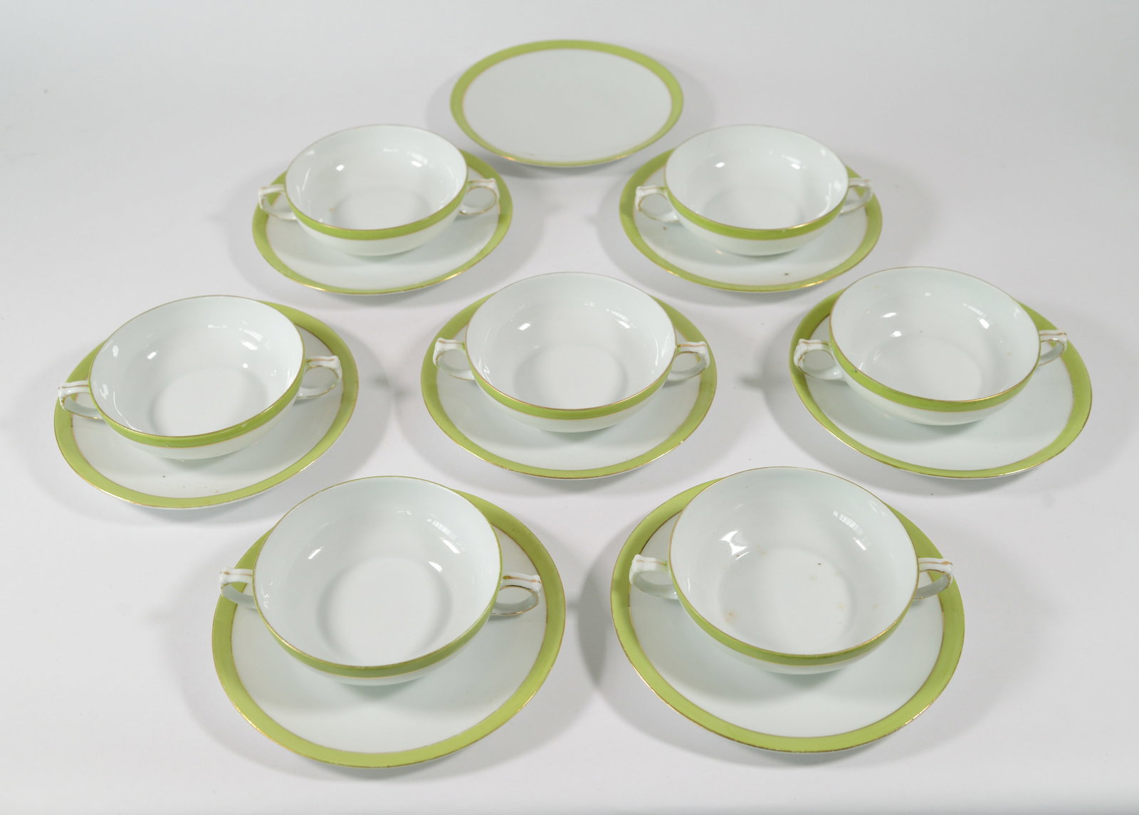 Eight Victoria Austria Porcelain Saucers and Seven Teacups. (1 of 3)