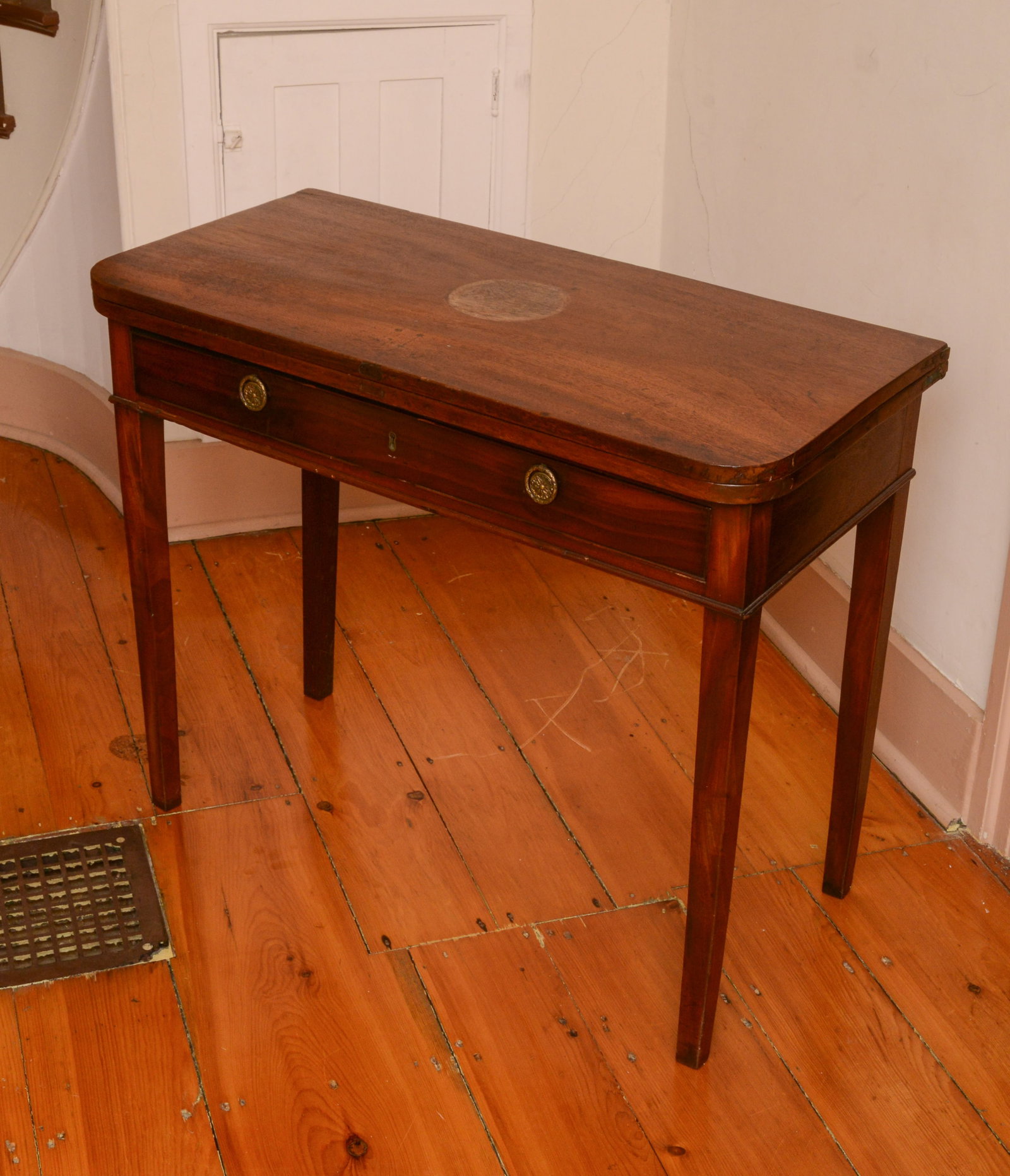 Hepplewhite Mahogany Card Table.: Height 29.5 inches, width 35.5 inches, depth 17 inches. Water ring to top, some scratches. NO SHIPPING AVAILABLE. This item must be picked up Friday, June 19th in Kennebunkport, Maine.