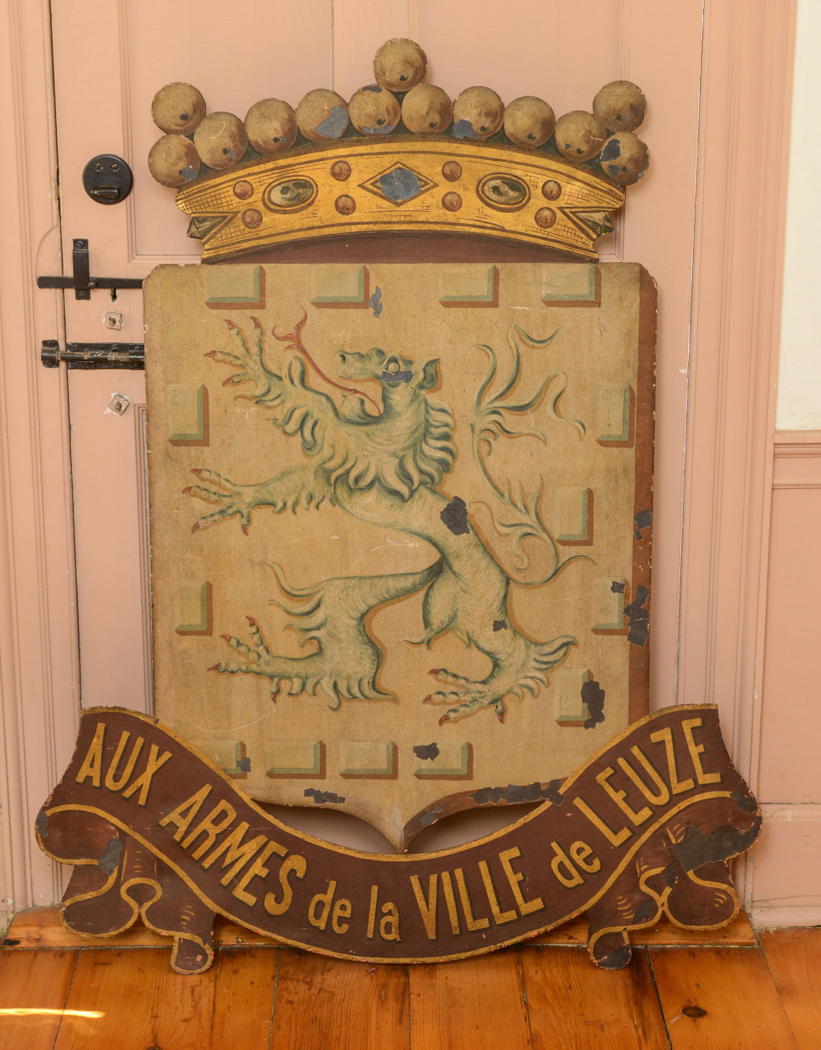 French Coat of Arms: Aux Armes de la Villa de Leuze.: Painted tin, 50 x 39 inches. Some paint loss.