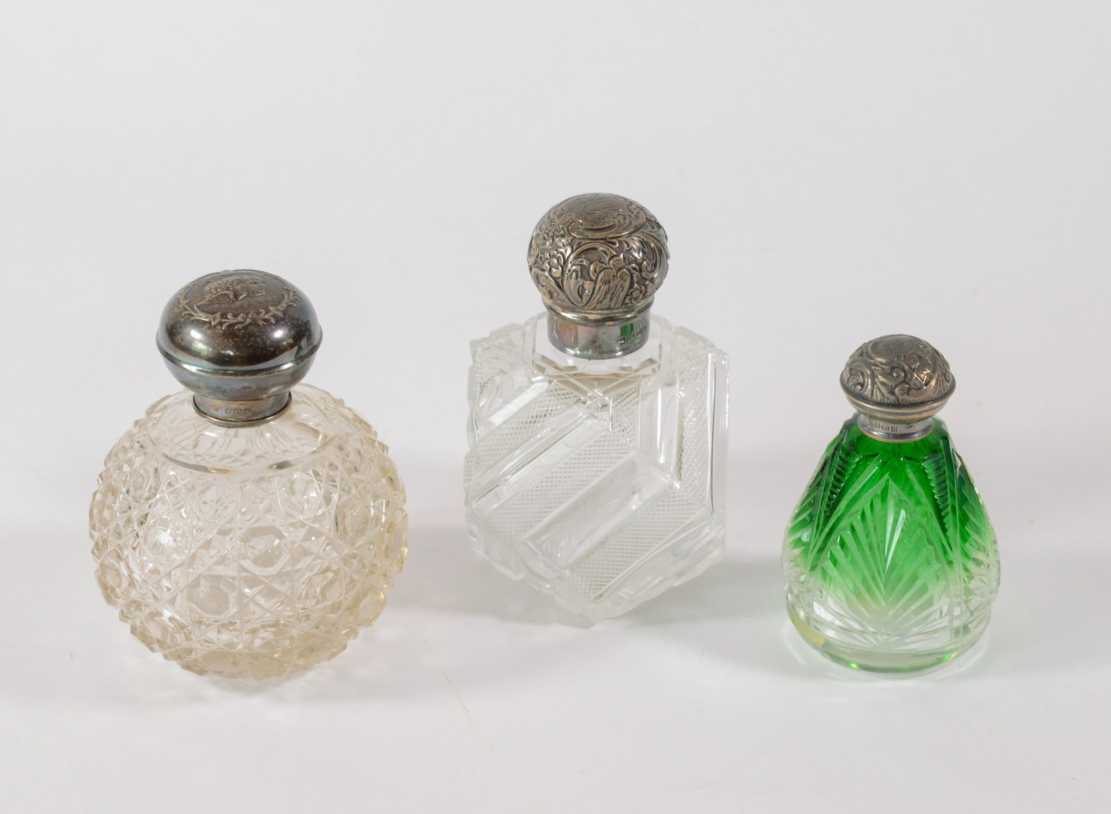 Three Perfume Bottles With Sterling Caps. (1 of 8)