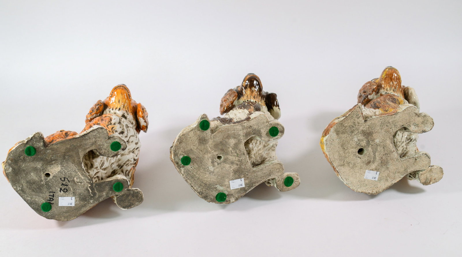 Three Glazed Concrete Dogs. - 3