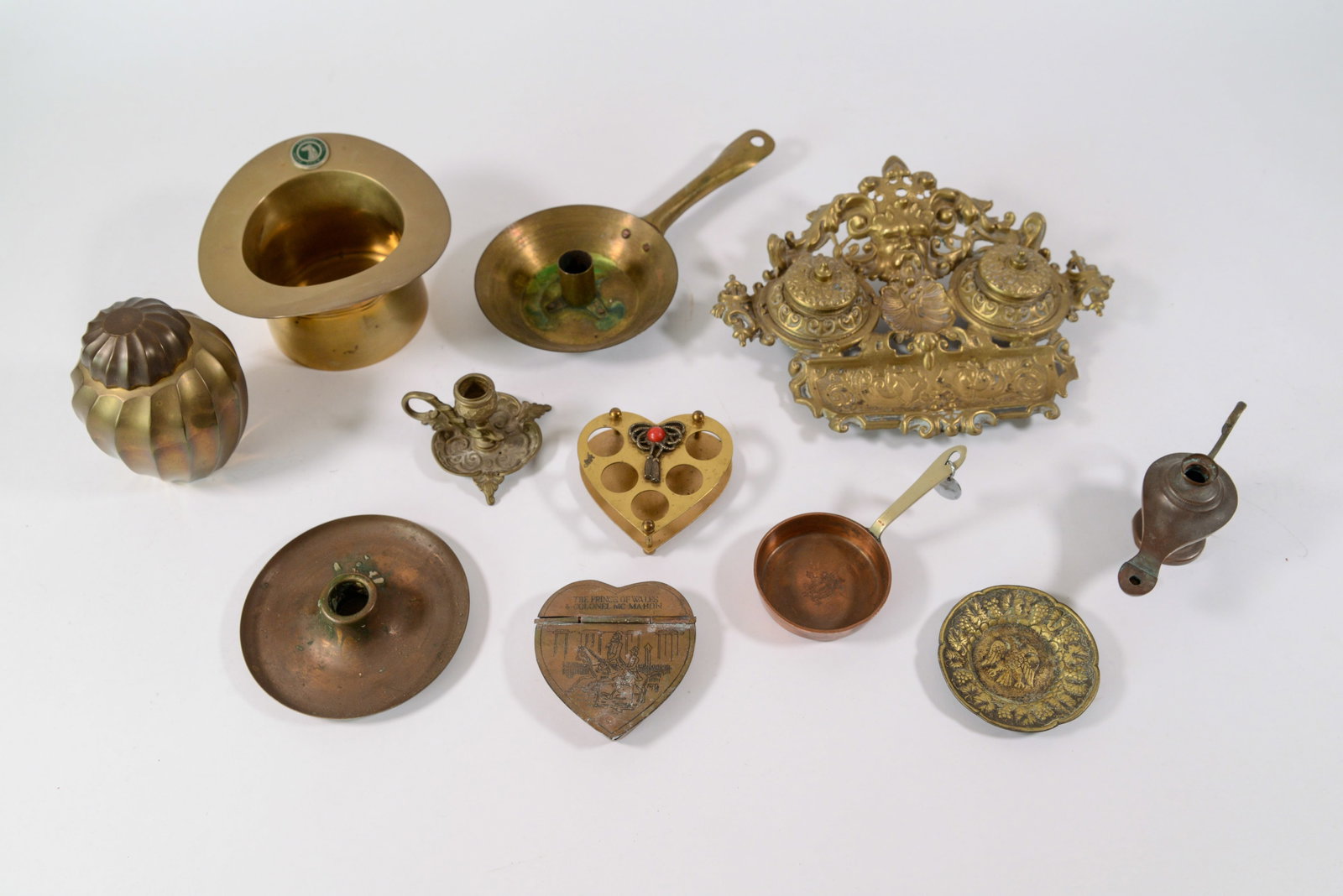 Group of Metalware.: Inkwell, Channel City Horse Show hat, miniature chamberstick, and others.