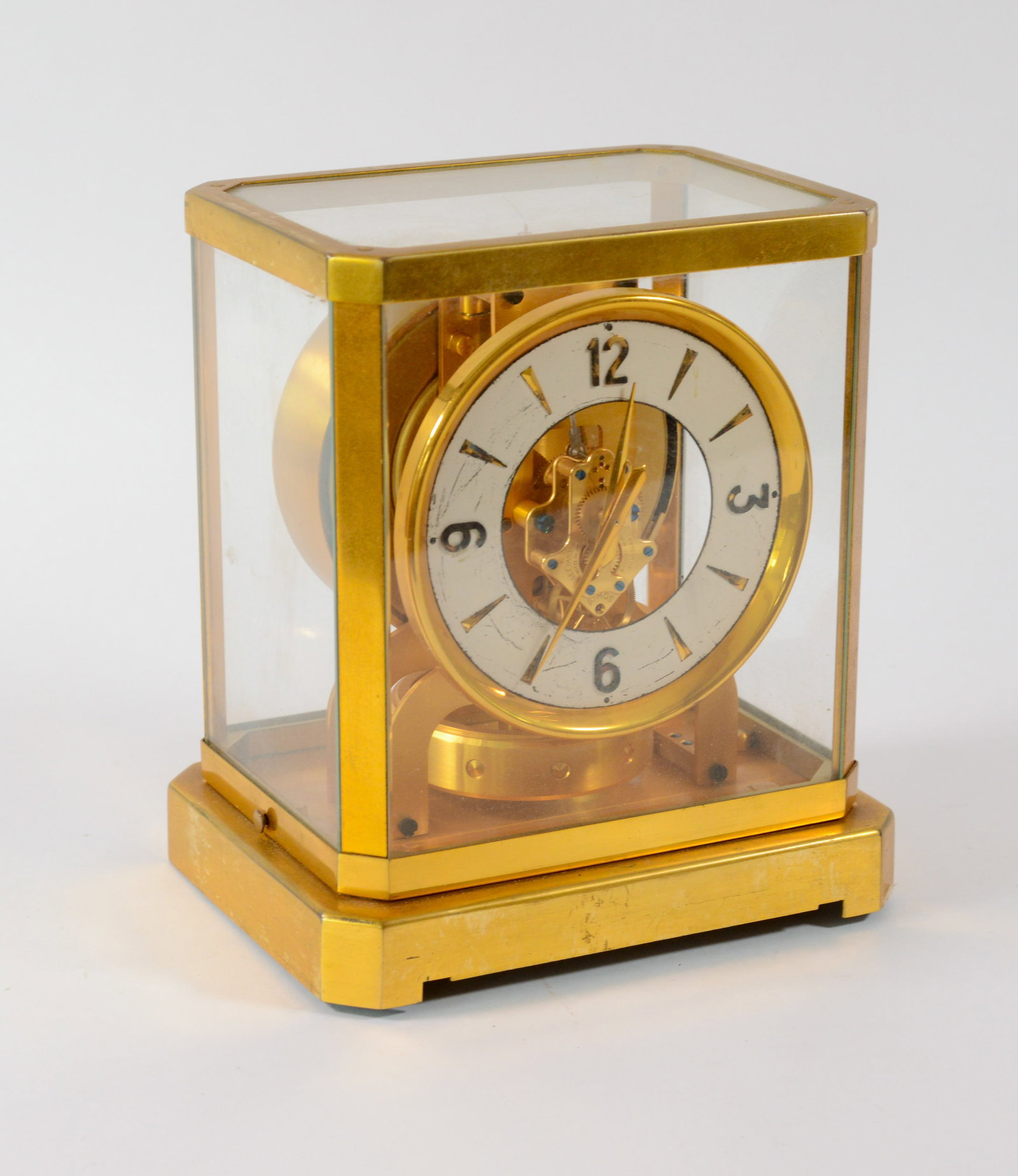 Jaeger-LeCoultre Atmos Clock.: Some scratches to face, with original box. Appears to be operational.