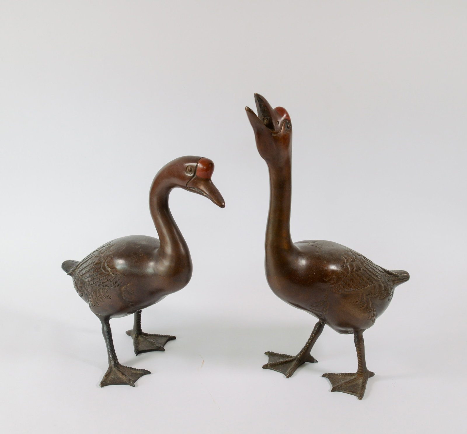 Pair of Bronze Ducks.: Heights 12 and 15 inches.