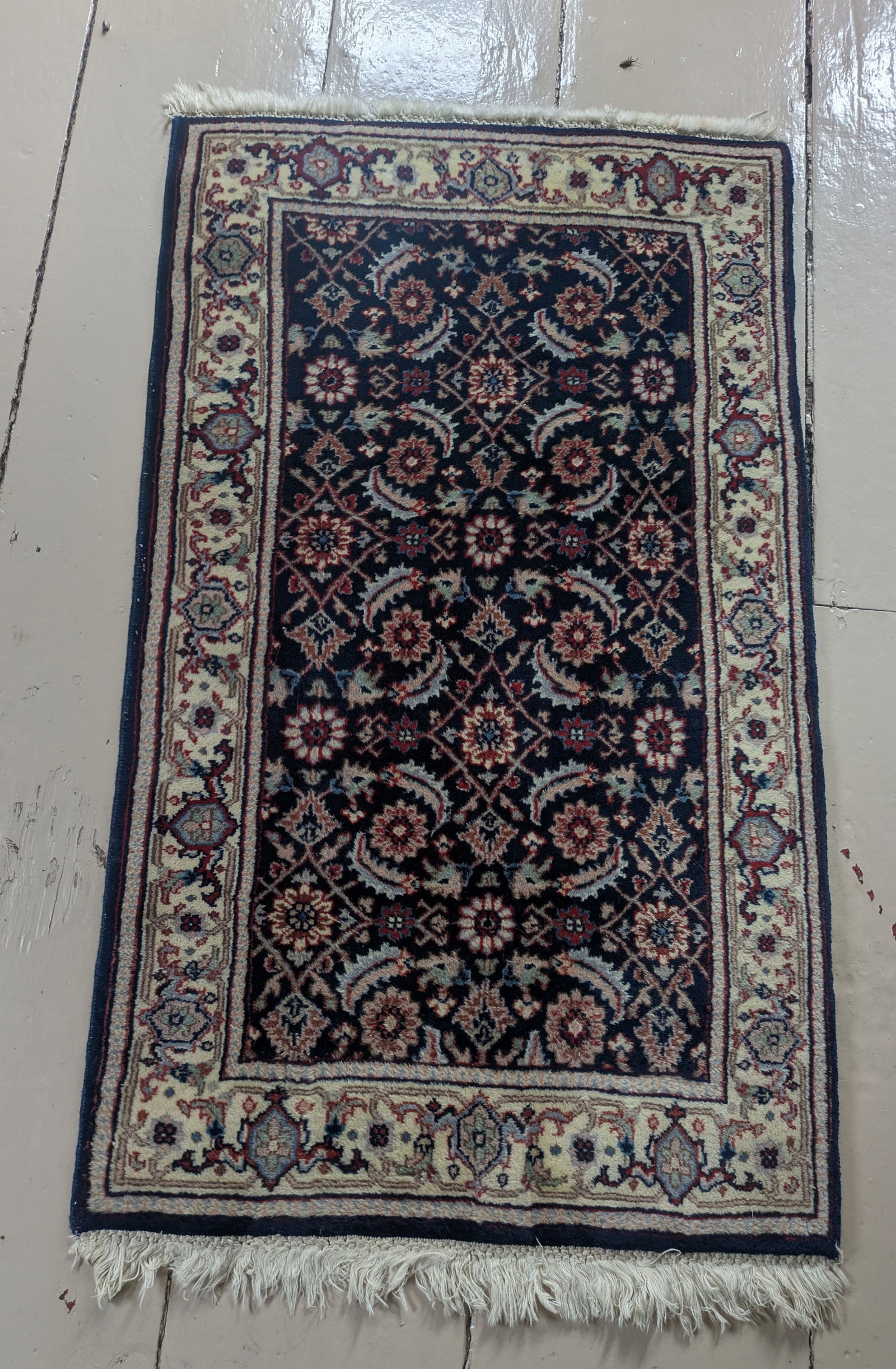 Small Wool Oriental Carpet.: 48 x 28 inches.