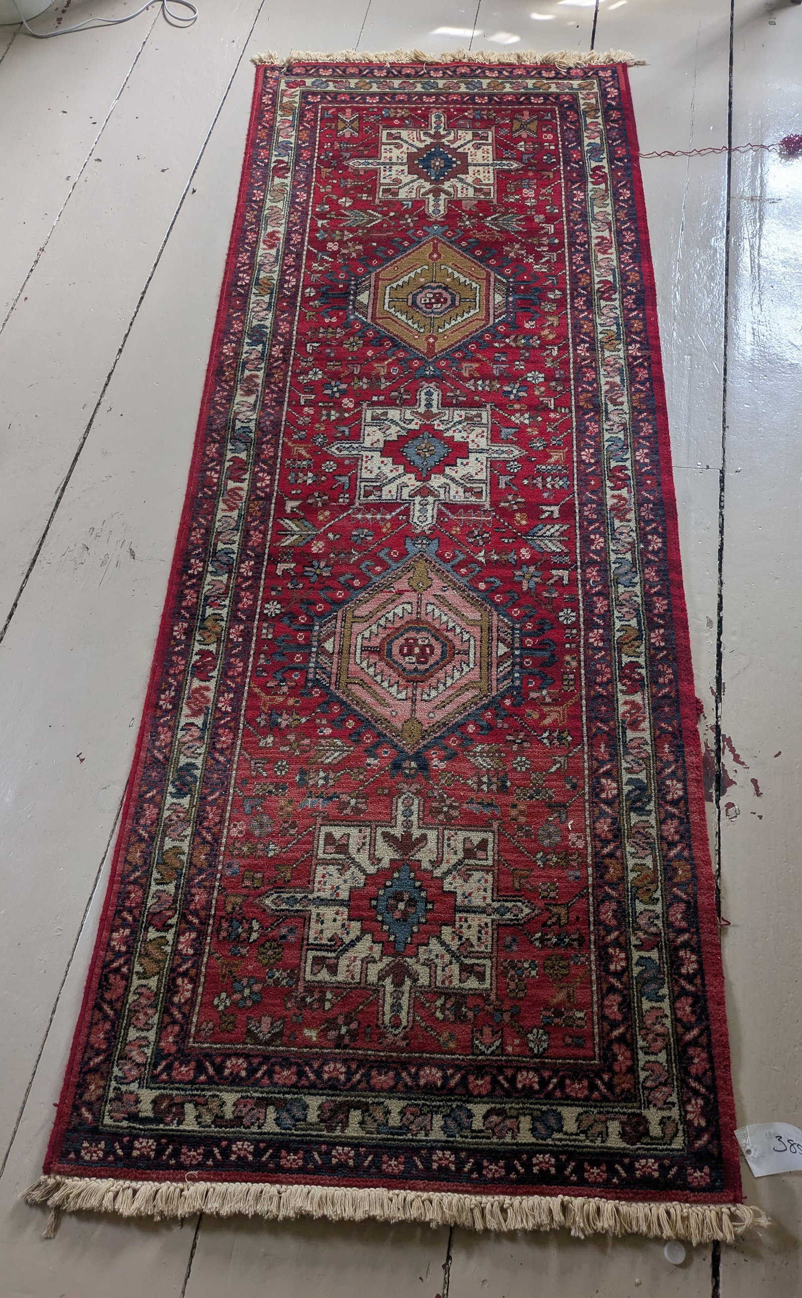 Oriental Runner With Red Ground.: 8 feet by 3 feet.