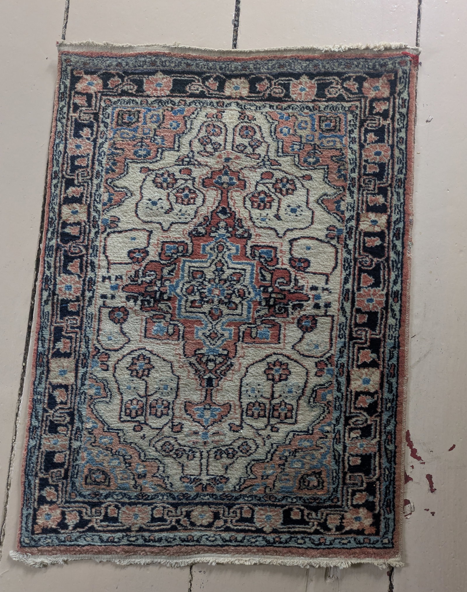 Small Oriental Mat.: 34 x 24 inches.