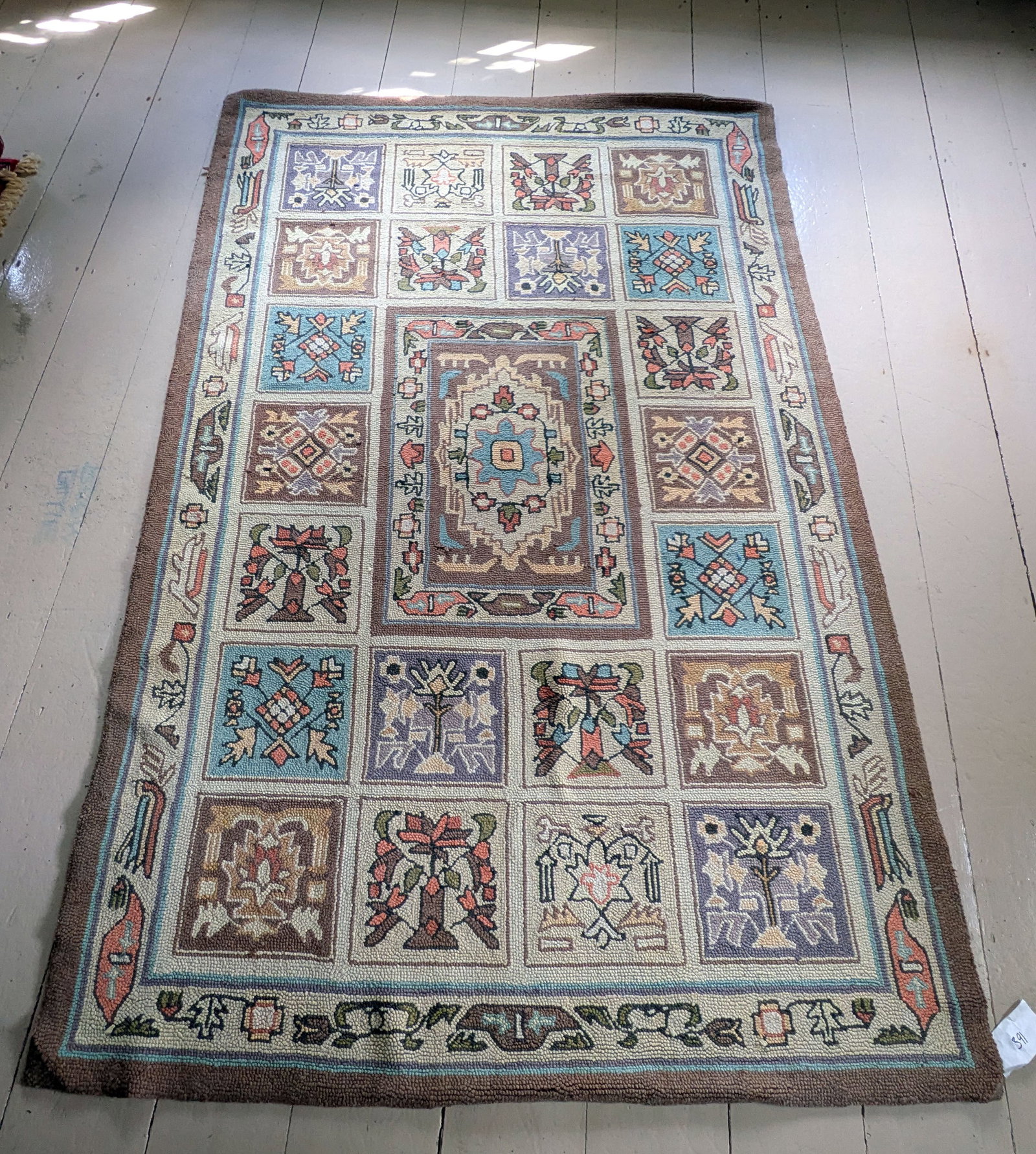 Contemporary Hooked Rug: 8 feet 2 inches by 5 feet 4 inches.