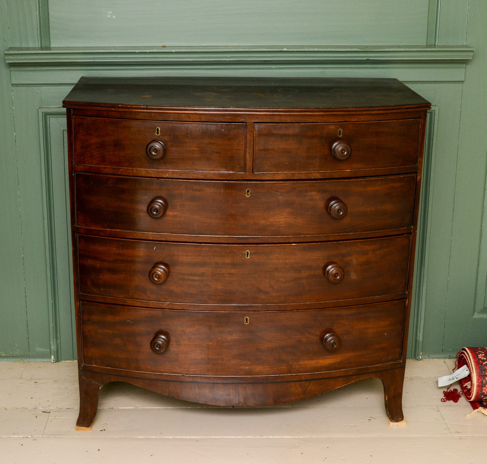 Mahogany Bowfront Chest of Drawers: Height 41 inches, width 41.5 inches, depth 21 inches. Some wear and water stains. NO SHIPPING AVAILABLE. This item must be picked up Friday, June 19th in Kennebunkport, Maine.