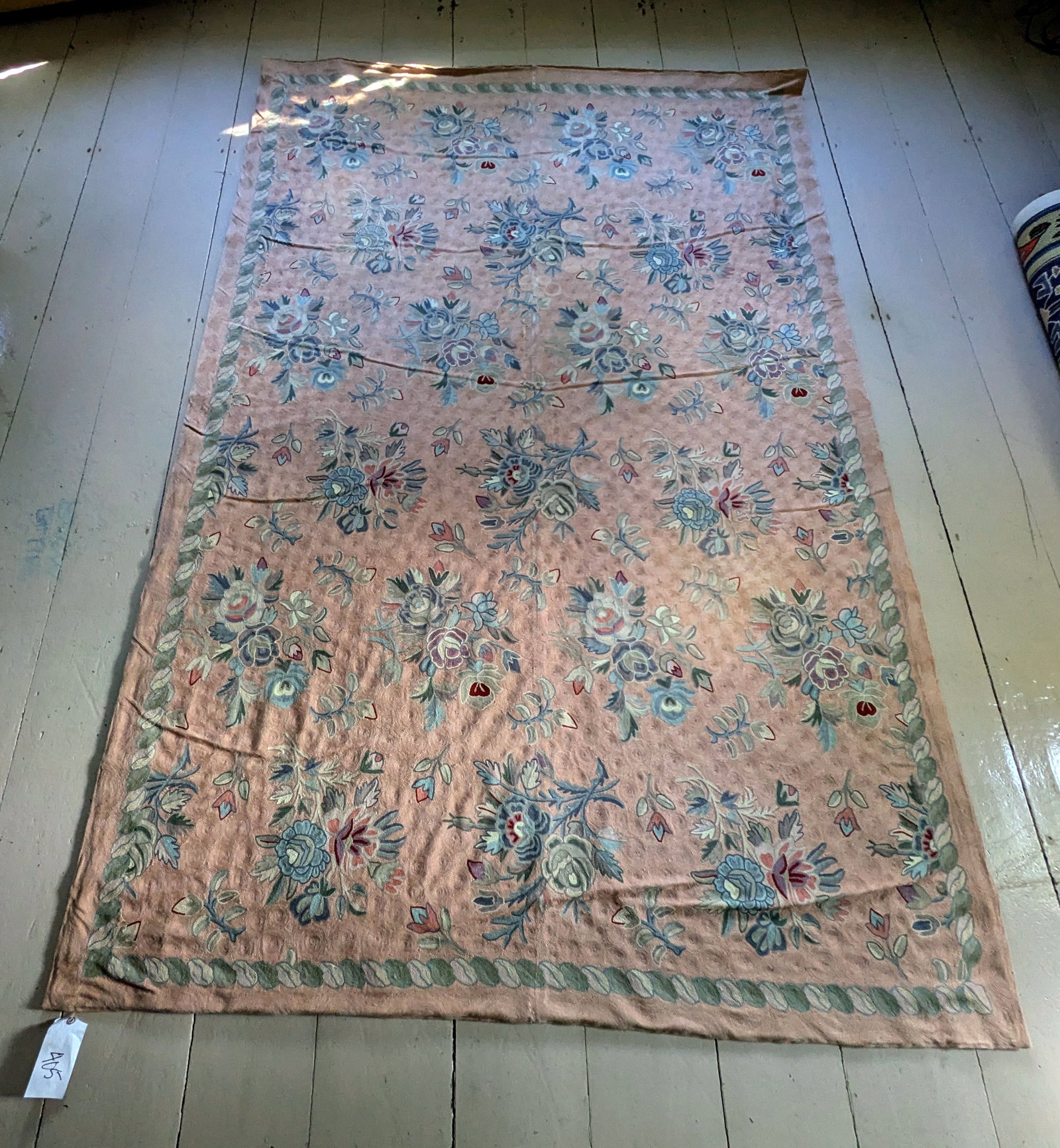 Needlepoint Carpet With Pink Ground.: 8 feet 10 inches by 5 feet 10 inches.