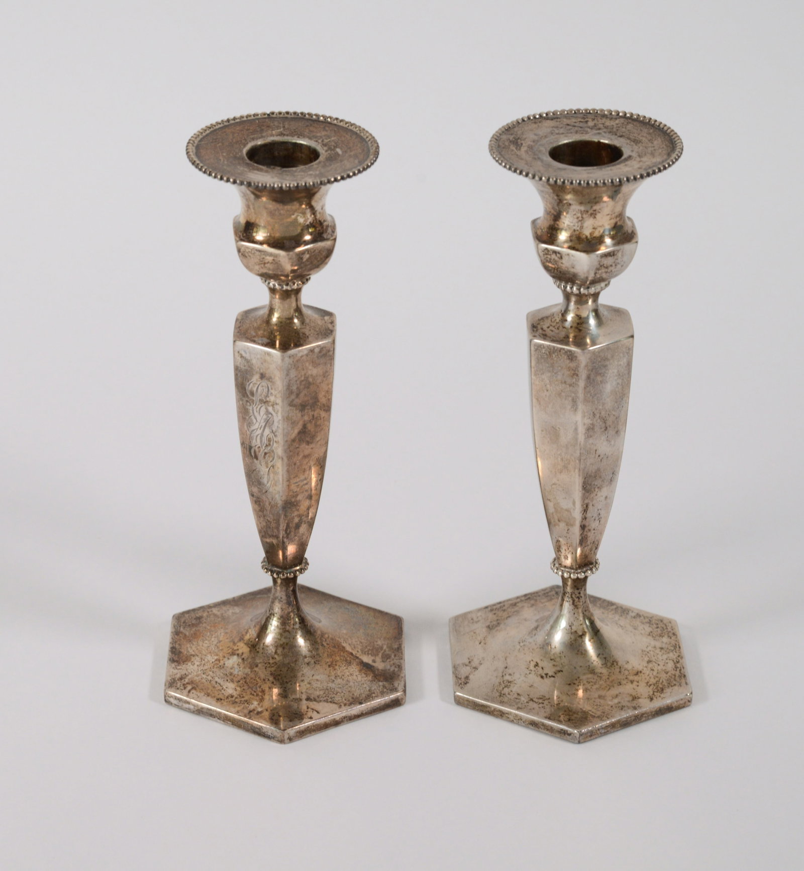 Pair of Shreve, Crump & Low Weighted Sterling Candlesticks.: Height 8 inches, 760 grams.