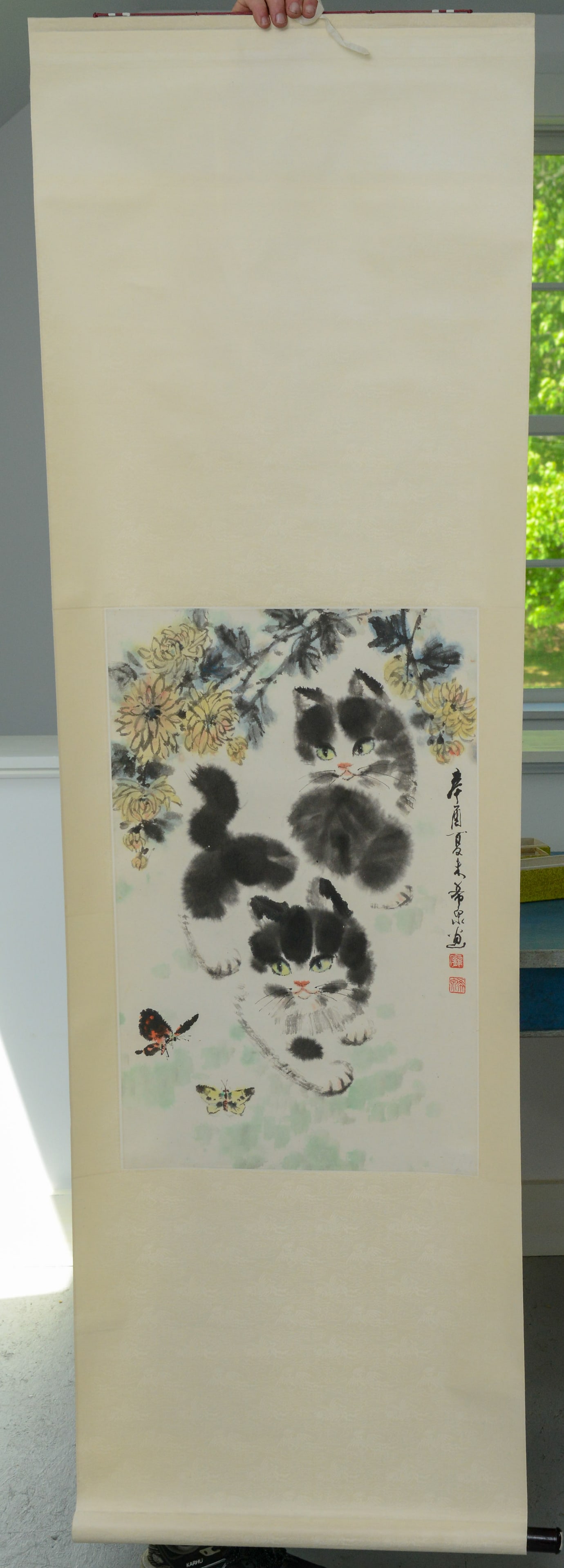 Three Chinese Scroll Paintings.: One with cats, two with women. Width 22 inches.