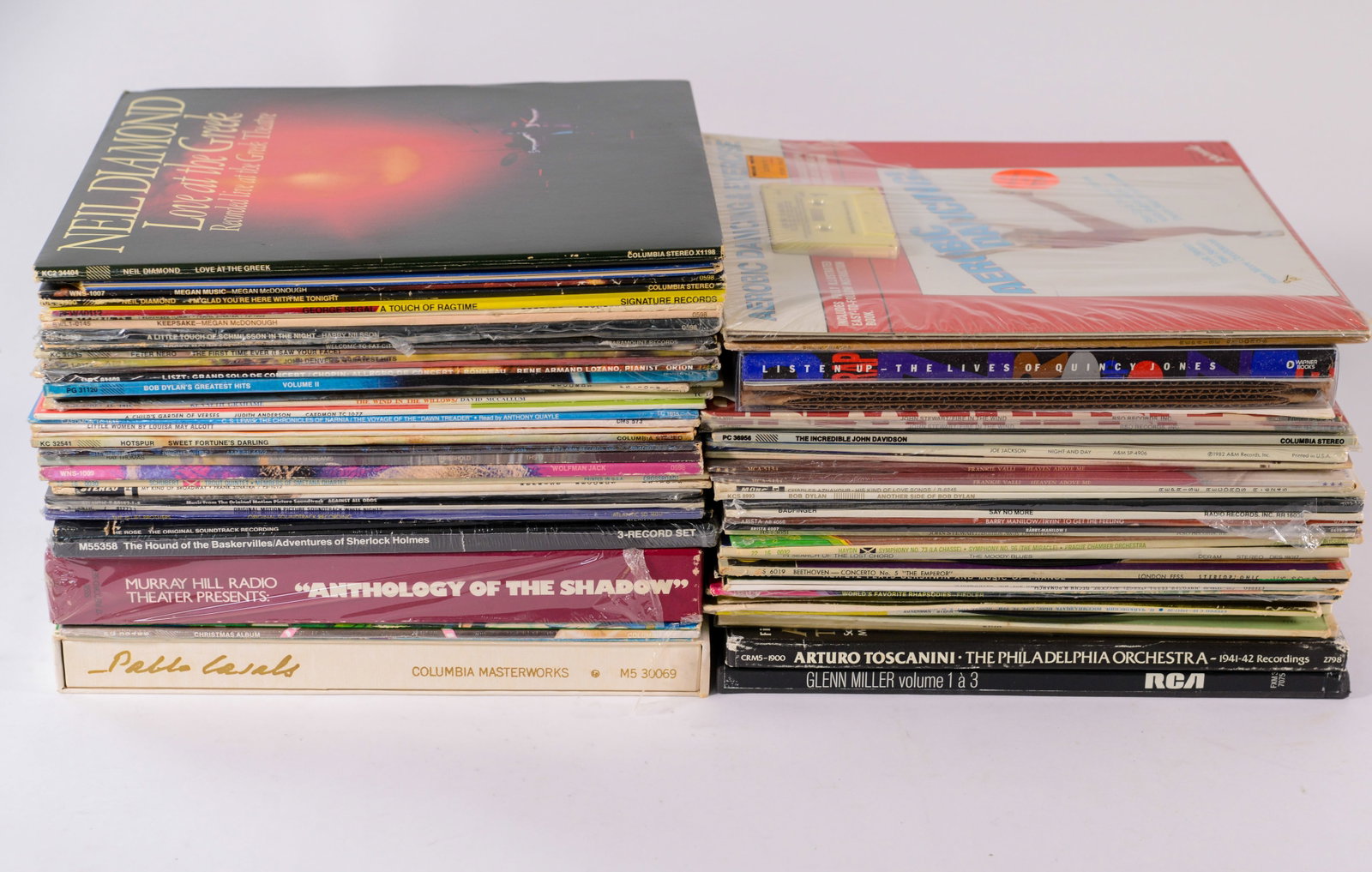 Jane & Jerry Weintraub's Record Collection: Box 7: Listen Up: The Lives of Quincy Jones CD set with book and poster, Barry Manilow, John Stewart, and others. 70+ records. Several promotional copies. A few sleeves missing albums, a few albums missing