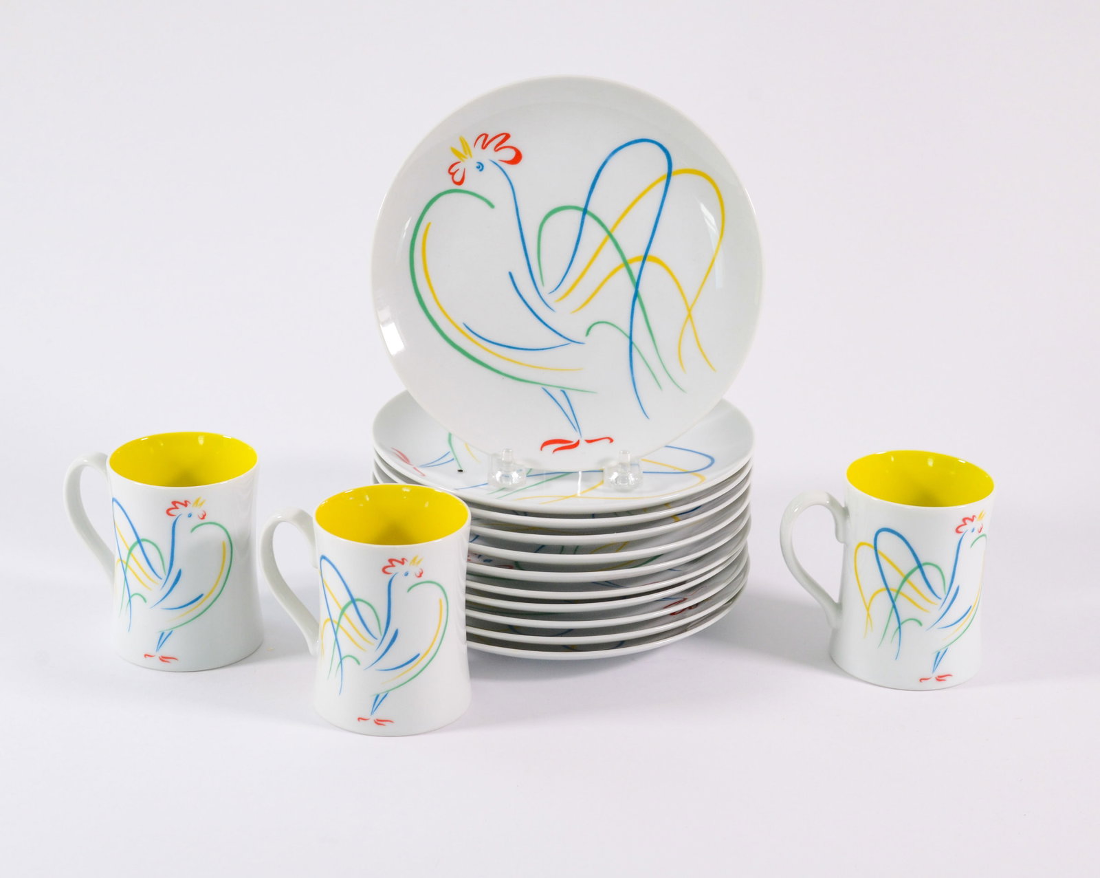 Three Fitz & Floyd Variations Mugs and Eleven Plates.: Diameter of plates 7.5 inches.