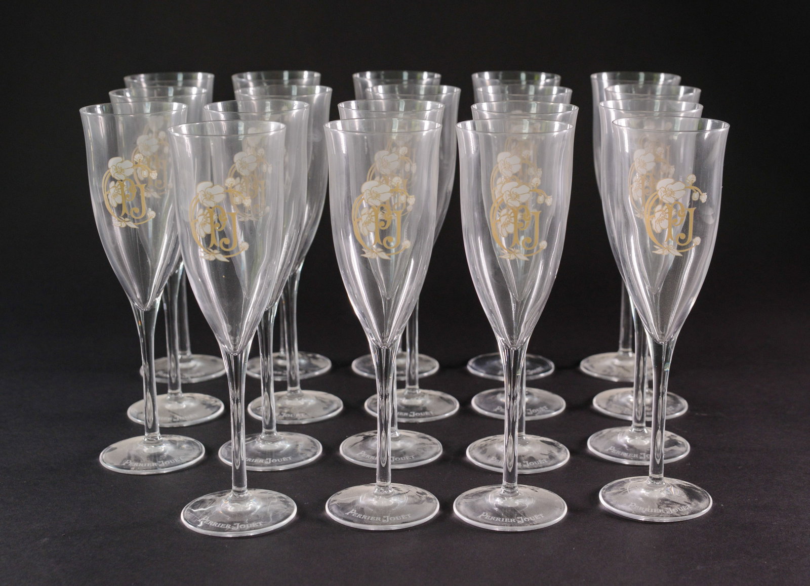 Nineteen Perrier-Jouet Champagne Flutes.: Height 8 inches. A few chips.