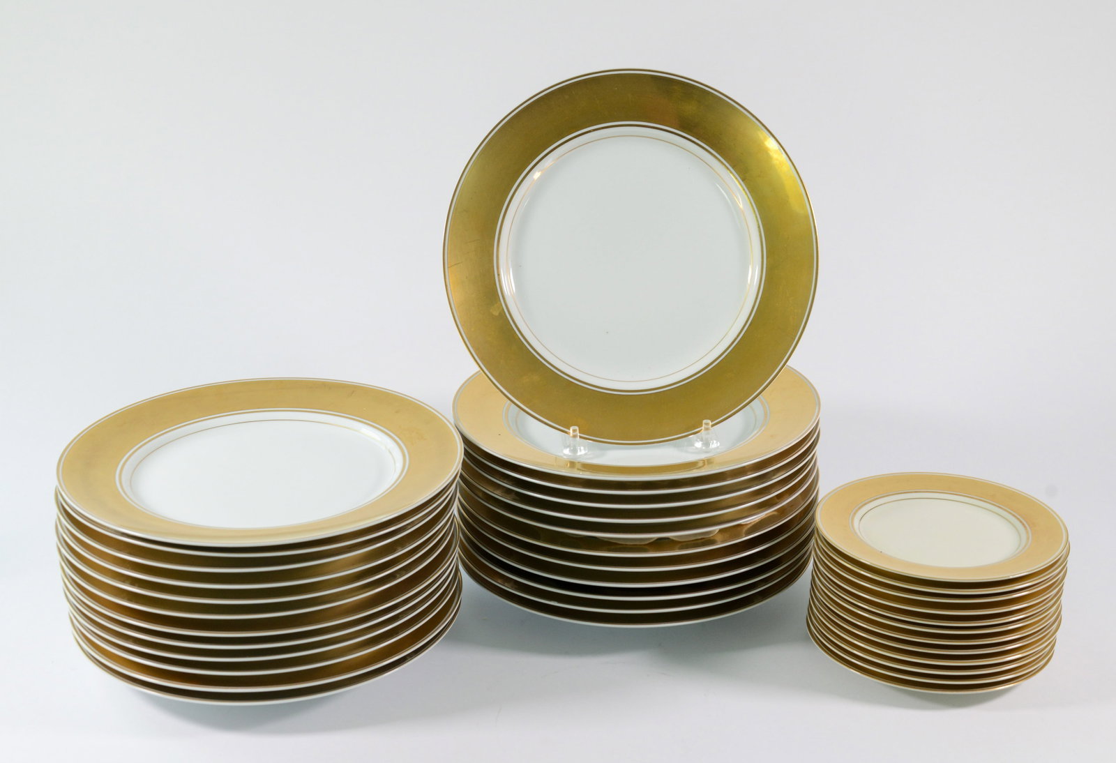 Thirty Six Fitz & Floyd Rondelet Plates.: Diameter of largest 12 inches.