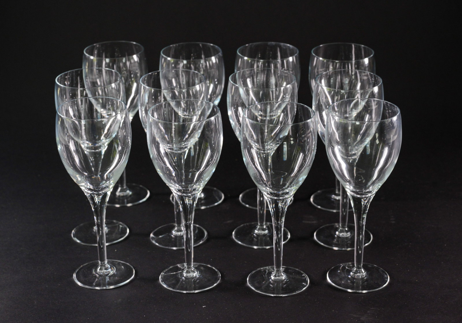 Twelve Stem Glasses.: Height 8 inches.