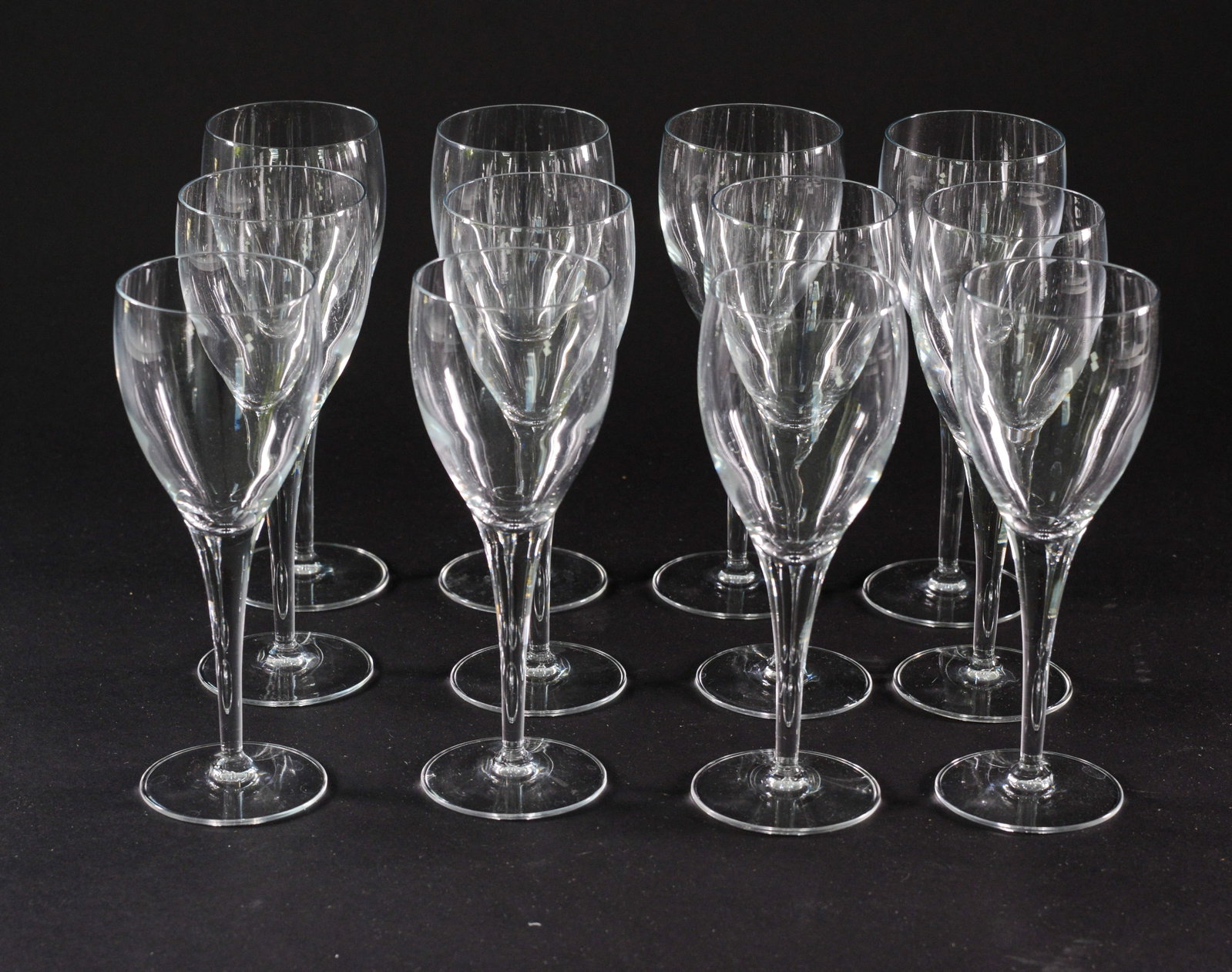 Twelve Stem Glasses.: Height 7.5 inches.