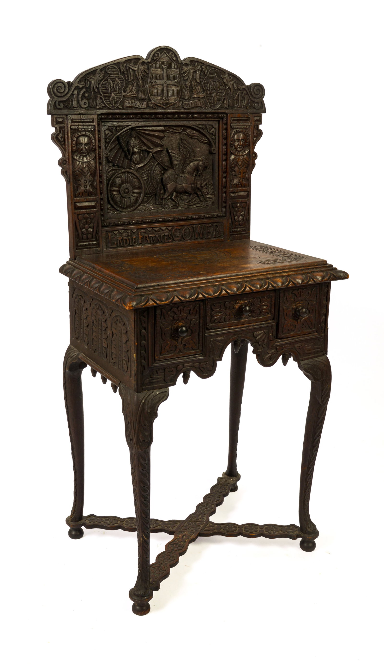 Lady Frances Gower's Carved Oak Dressing Table: The backsplash carved with chariot, figures, and coat of arm, dated 1654, and inscribed 'Lady Frances Gower.' Height of base 31 inches, width 22 inches, depth 16 inches. Overall height 49 inches.