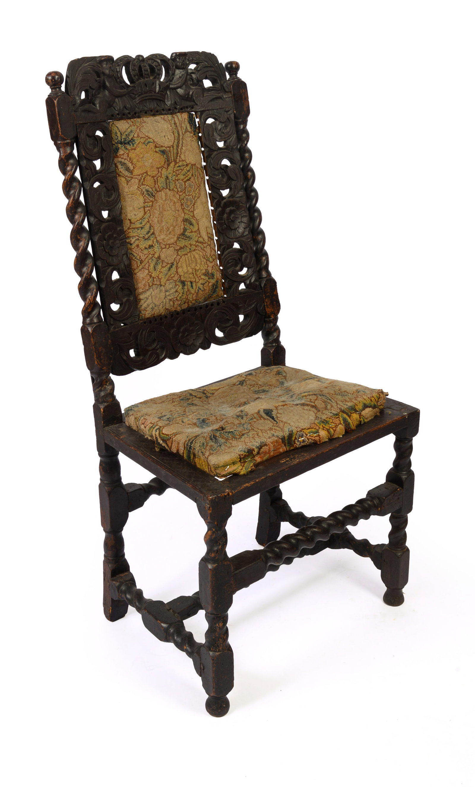 17th Century English Carved Side Chair.: With period needlepoint upholstery, seat height 17 inches, overall height 45 inches, width 20 inches. Repaired break to one side, seat upholstery has been reattached.