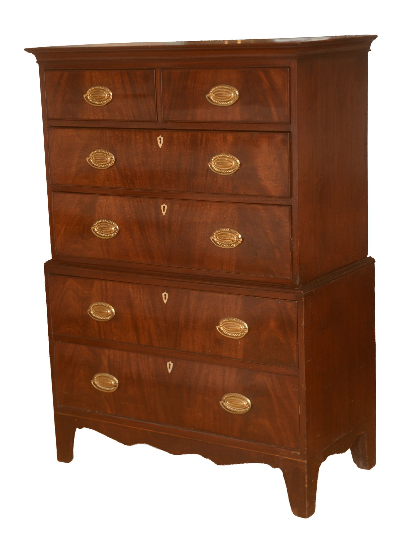 Early 19th Century Mahogany Lady's Chest on Chest: Upper Case having two over two long drawers, lower case having two long drawers, Ivory Key Decisions. Height 53 3/4 inches, width 36 inches, depth 18 1/2 inches.