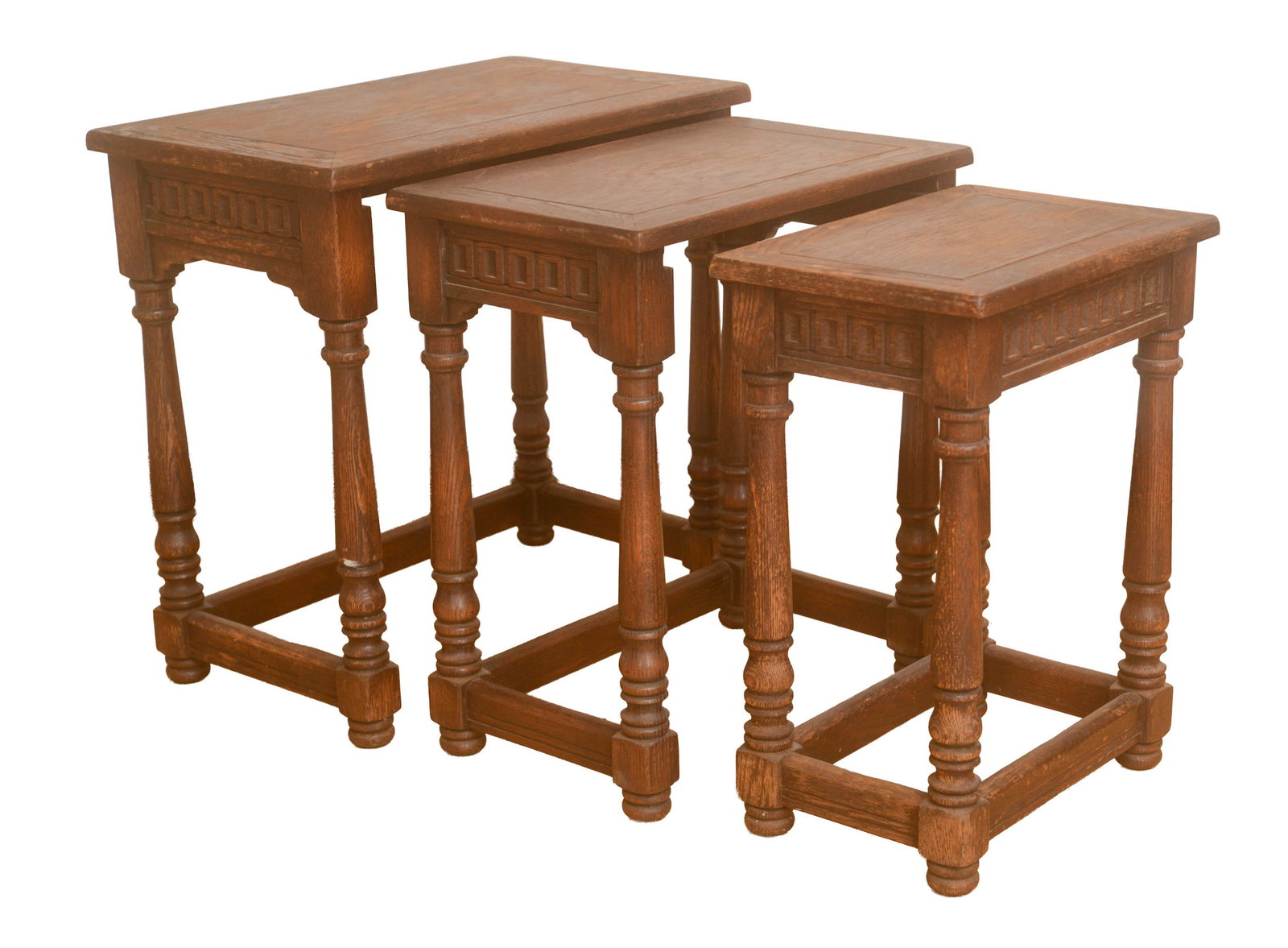 19th Century Nest of Three Carved Oak Tables.: Height 23 inches, width 24 inches, depth 14 inches.