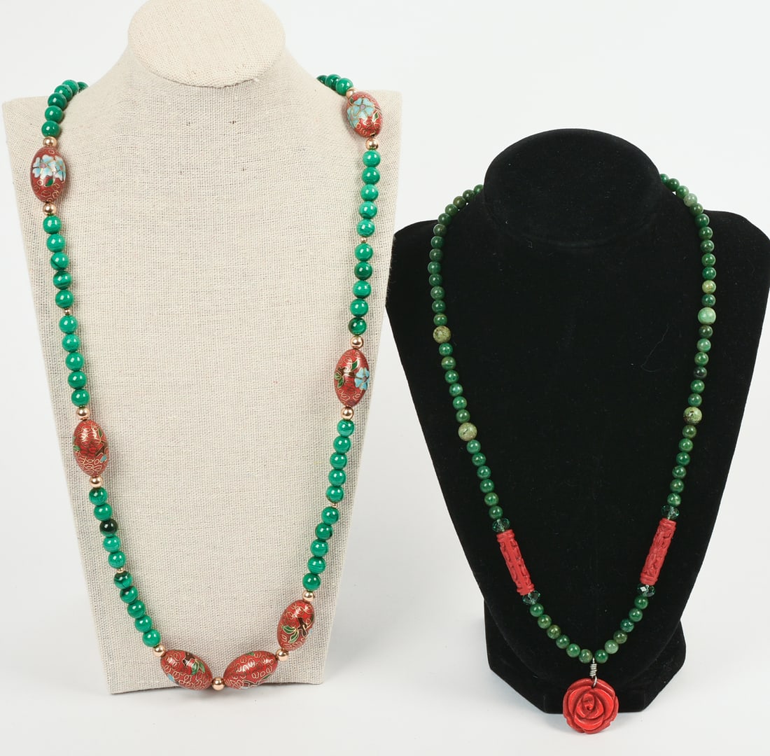Two Chinese Beaded Necklaces.: One jade, length 20 inches, the other hardstone, length 32 inches.