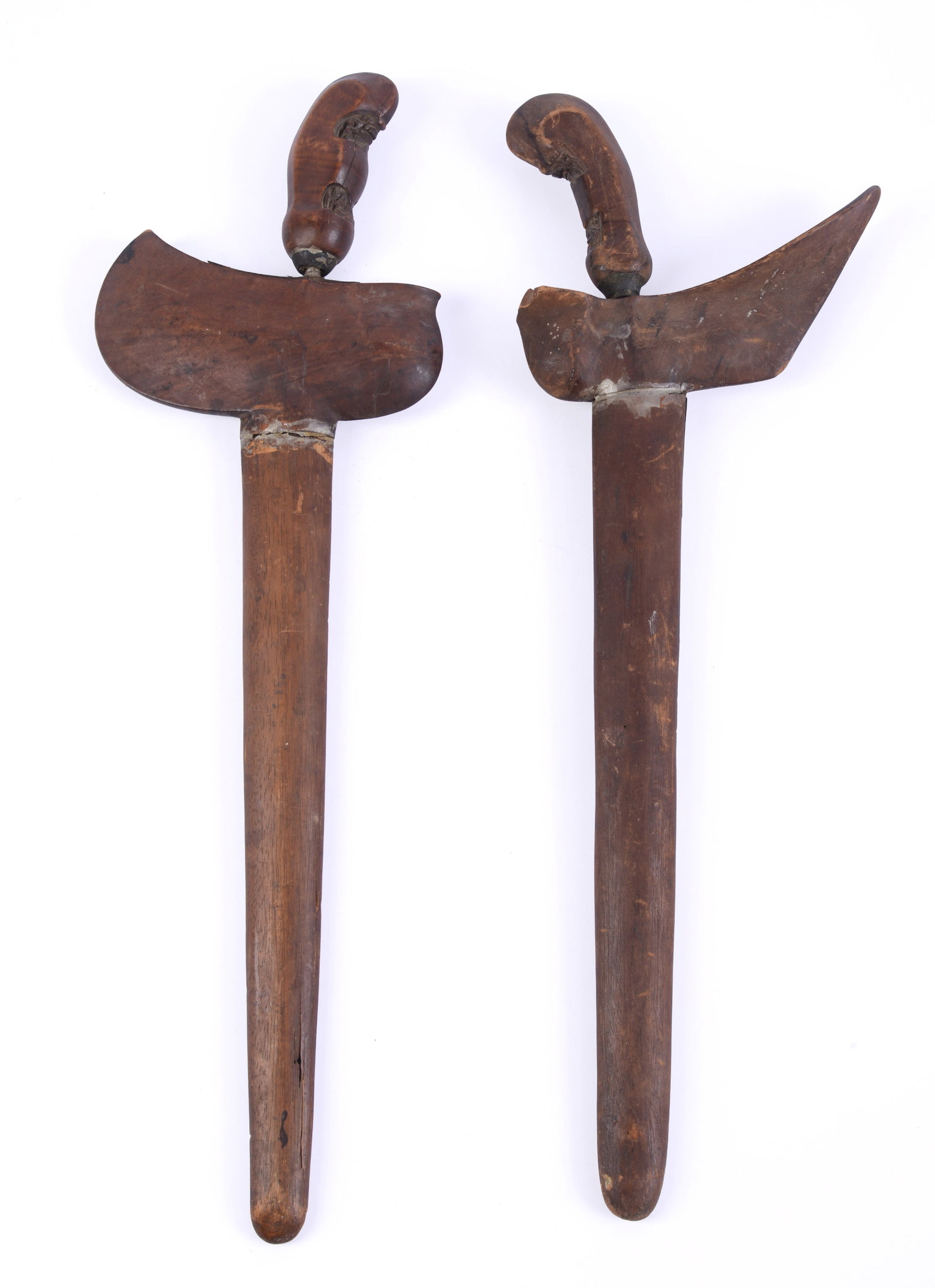 Two Indonesian Kris Daggers: Length 20 inches, Damascene blades, 19th c.
