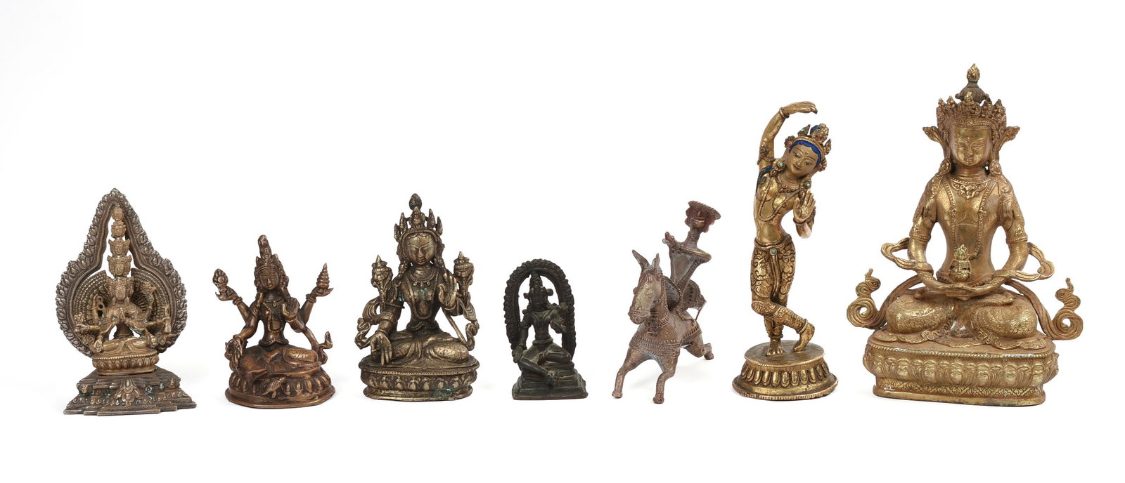 Seven Asian Cast Metal Sculptures.: Heights 4 to 10 inches.