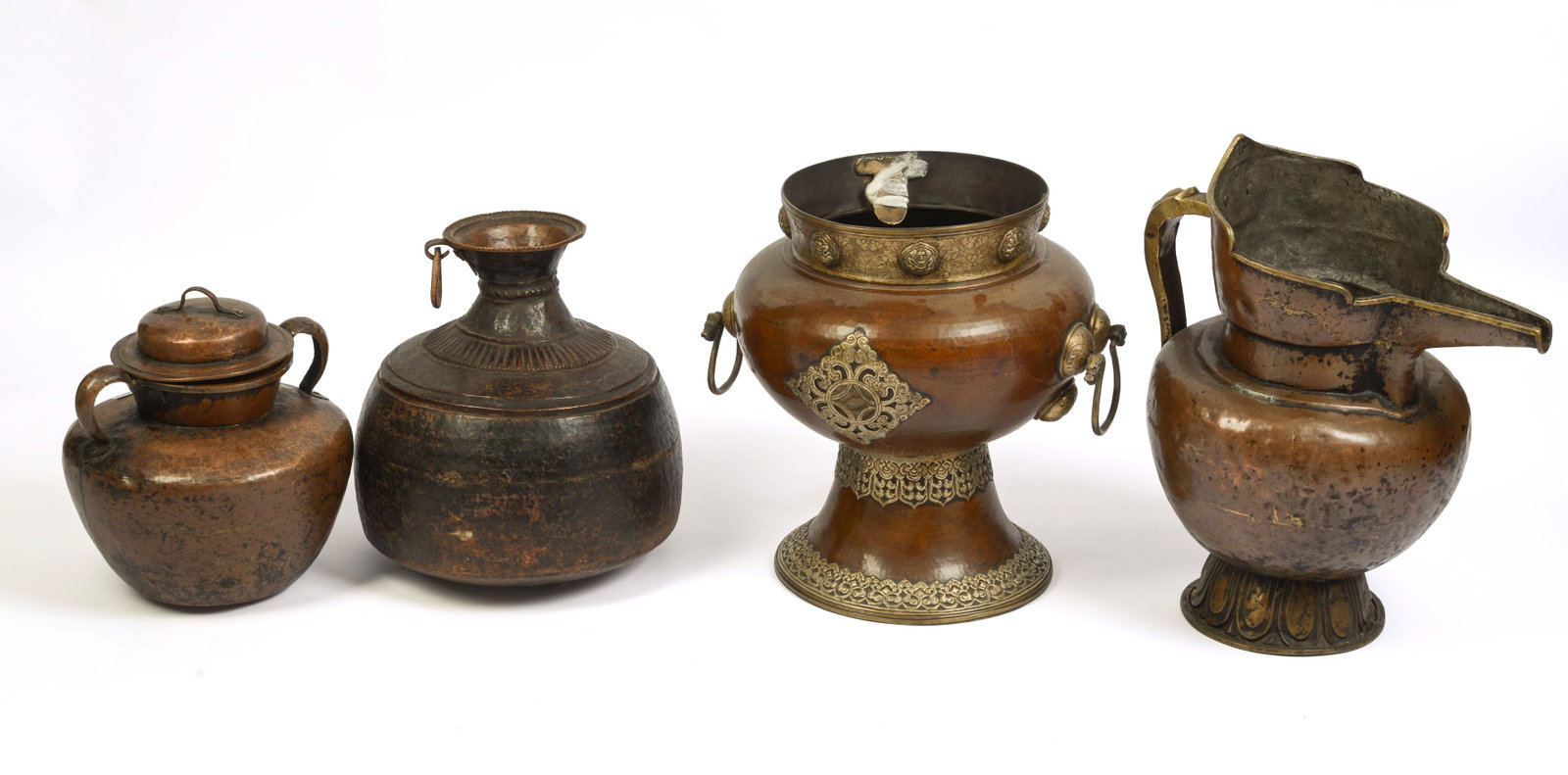 Four Large Asian Metal Vessels.: Heights 13, 14, 17 and 20 inches.