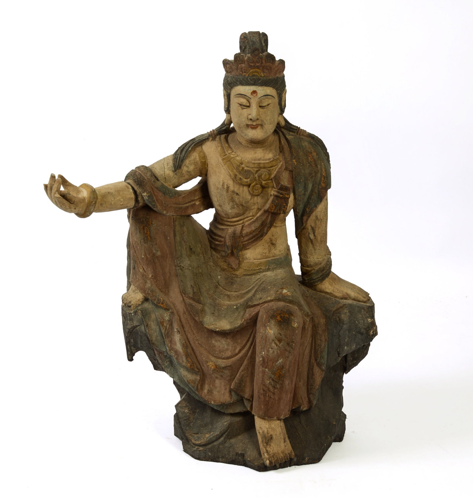 Carved Wooden Sculpture of a Guanyin.: Height 34 inches, traces of old paint. One hand possibly replaced.