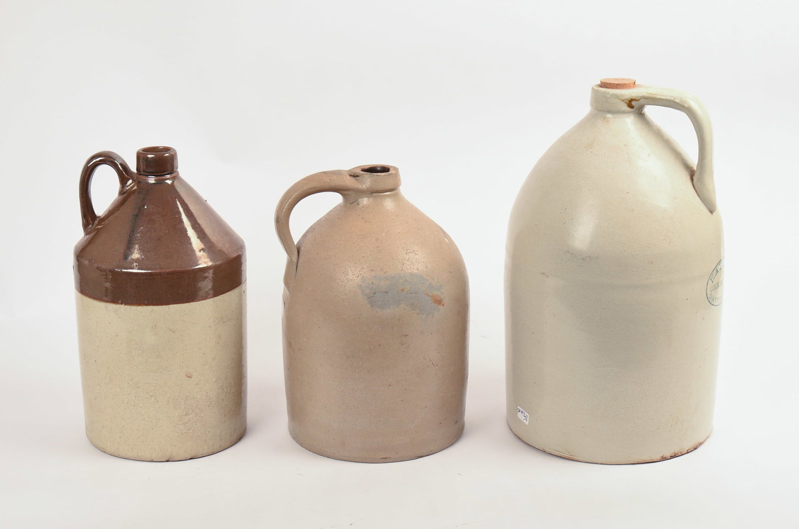 Three Stoneware Jugs. - 2