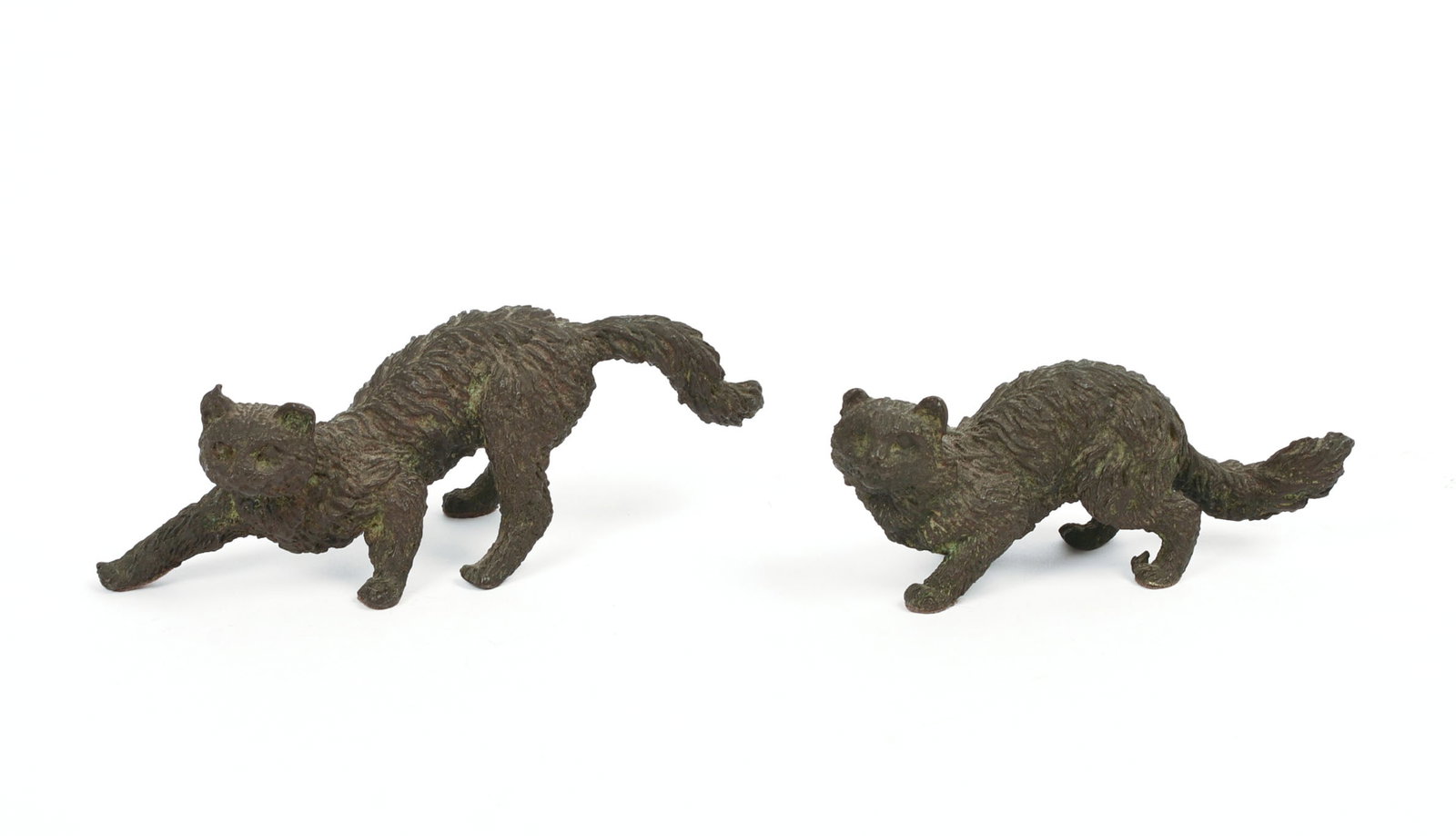Pair of Cast Bronze Cats.: Lengths 3.5 and 4 inches.