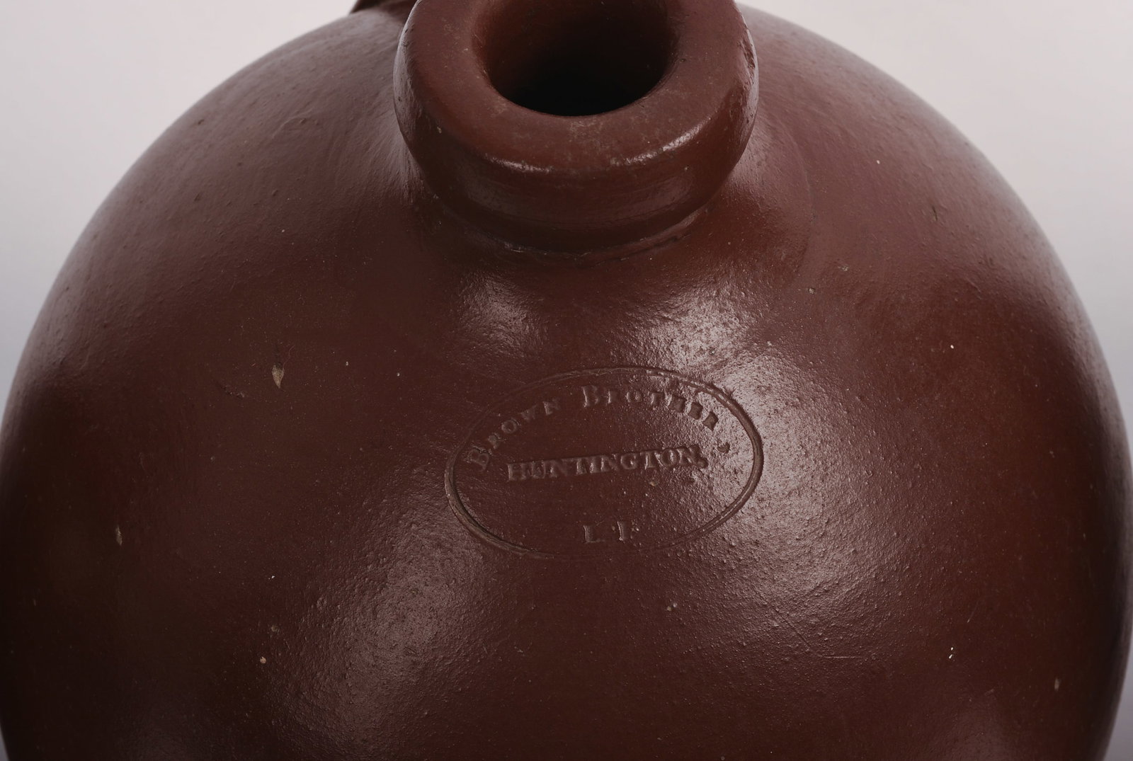 Three Redware Jugs. - 2