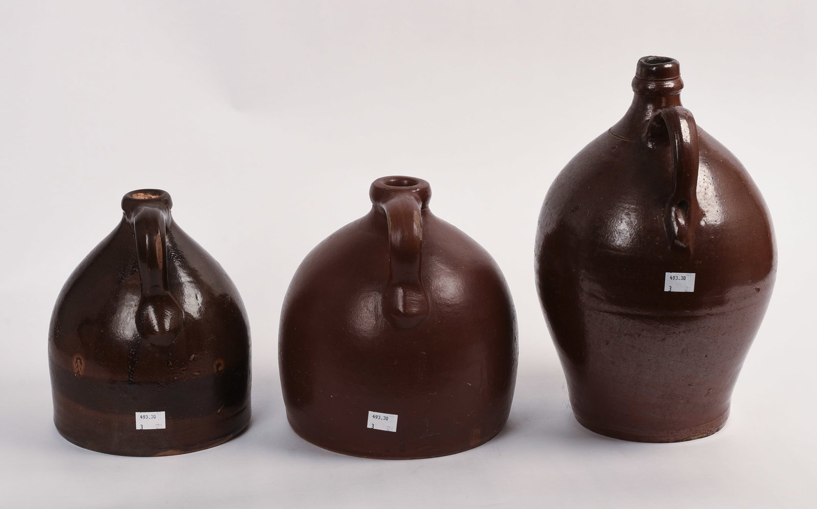 Three Redware Jugs. - 4