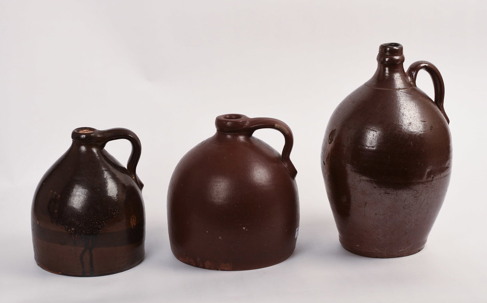 Three Redware Jugs. - 5