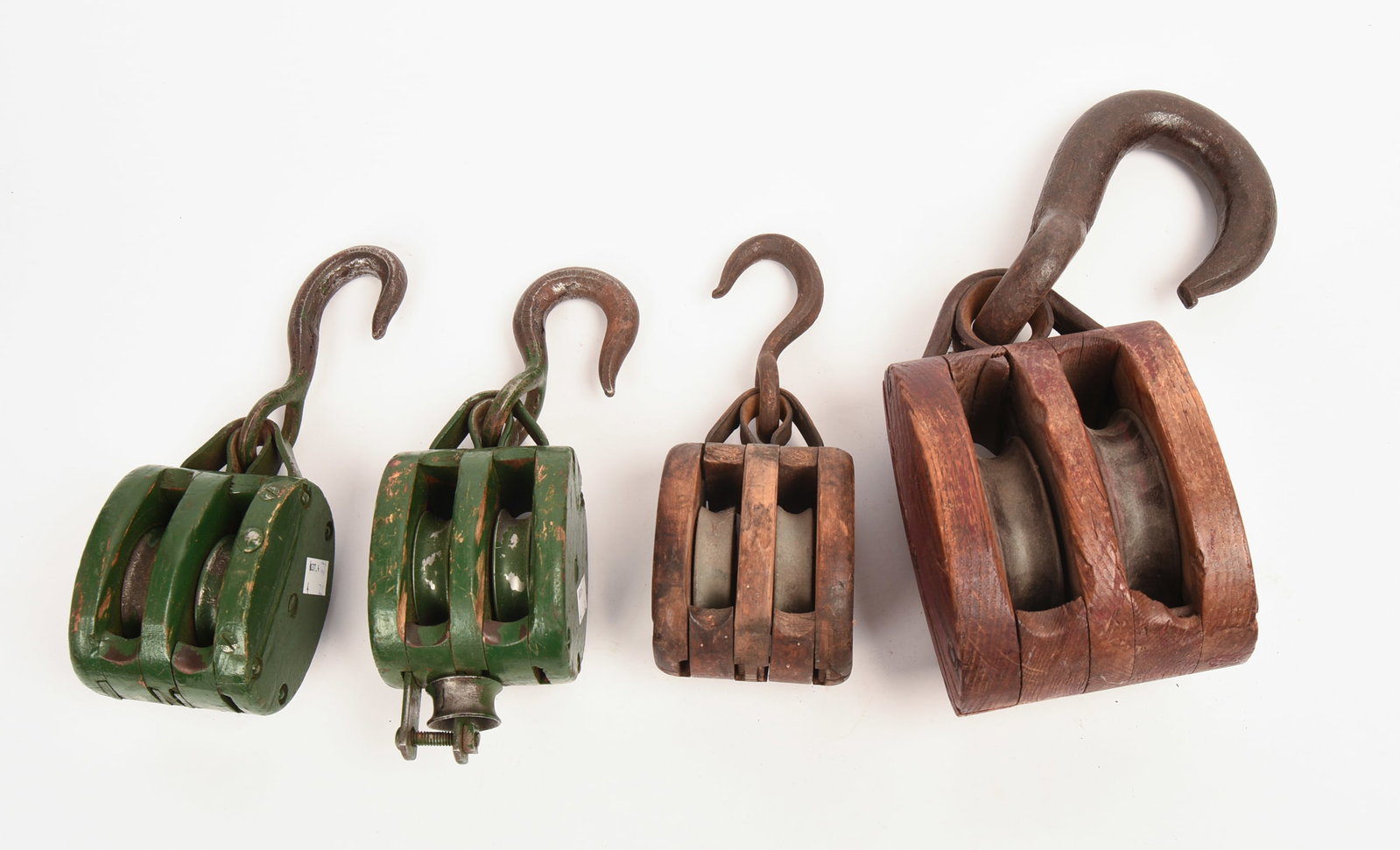 Four Antique Pulleys. - 4