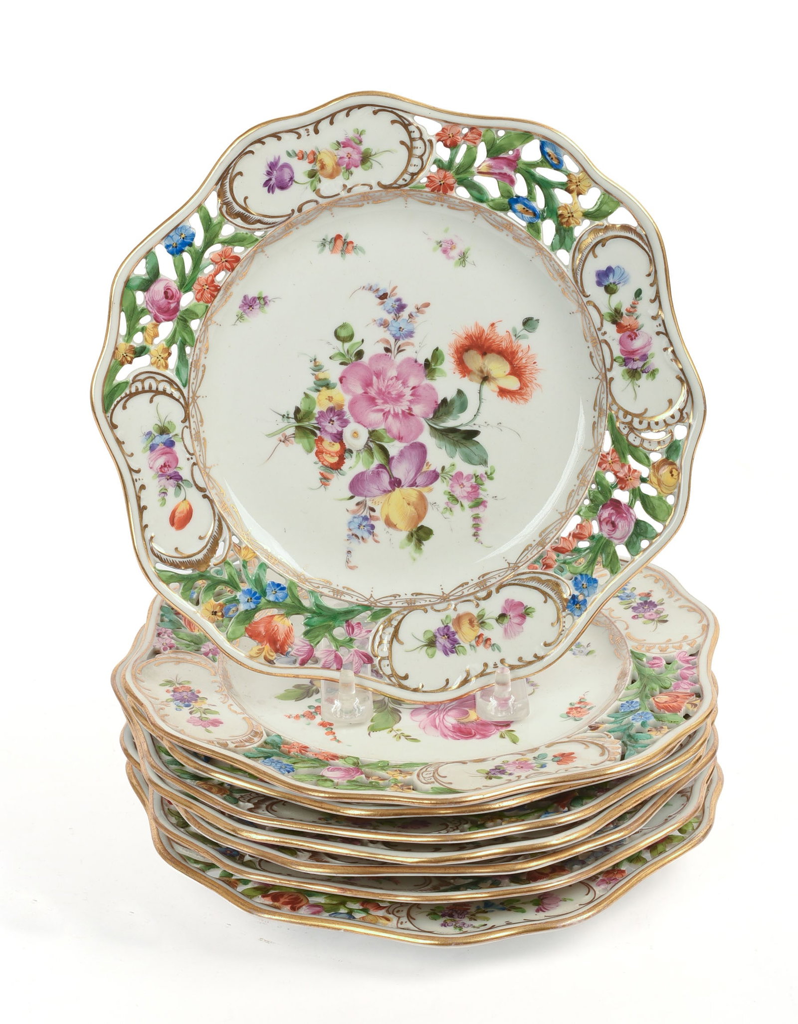 Eight Dresden Porcelain Plates: With Reticulated Borders, Dresden mark, diameter 9 inches. One with rim chip.