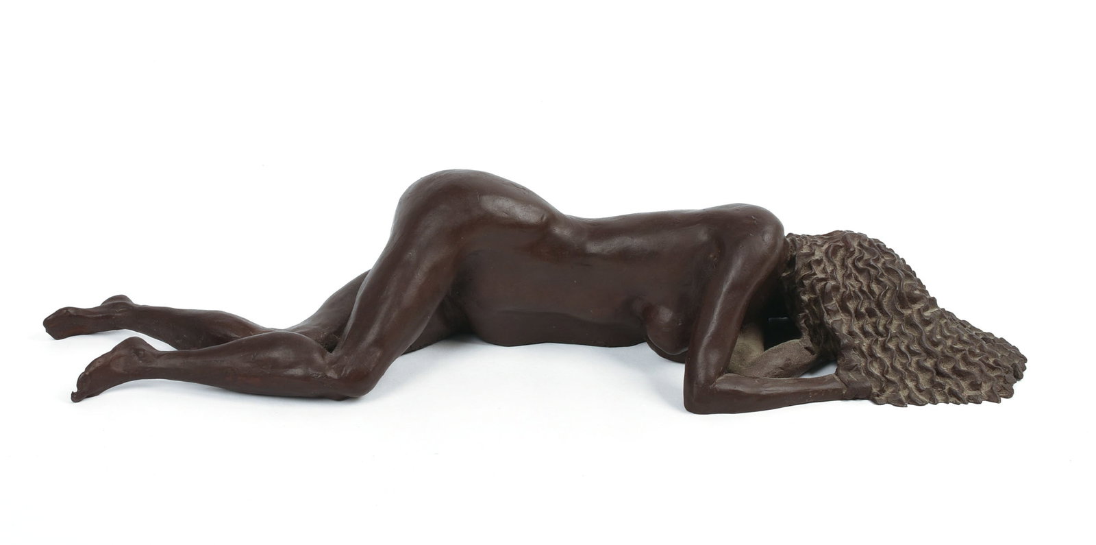 Cast Bronze Sculpture of a Sleeping Woman.: Length 17 inches. Signed Munn (?) and dated 1997.