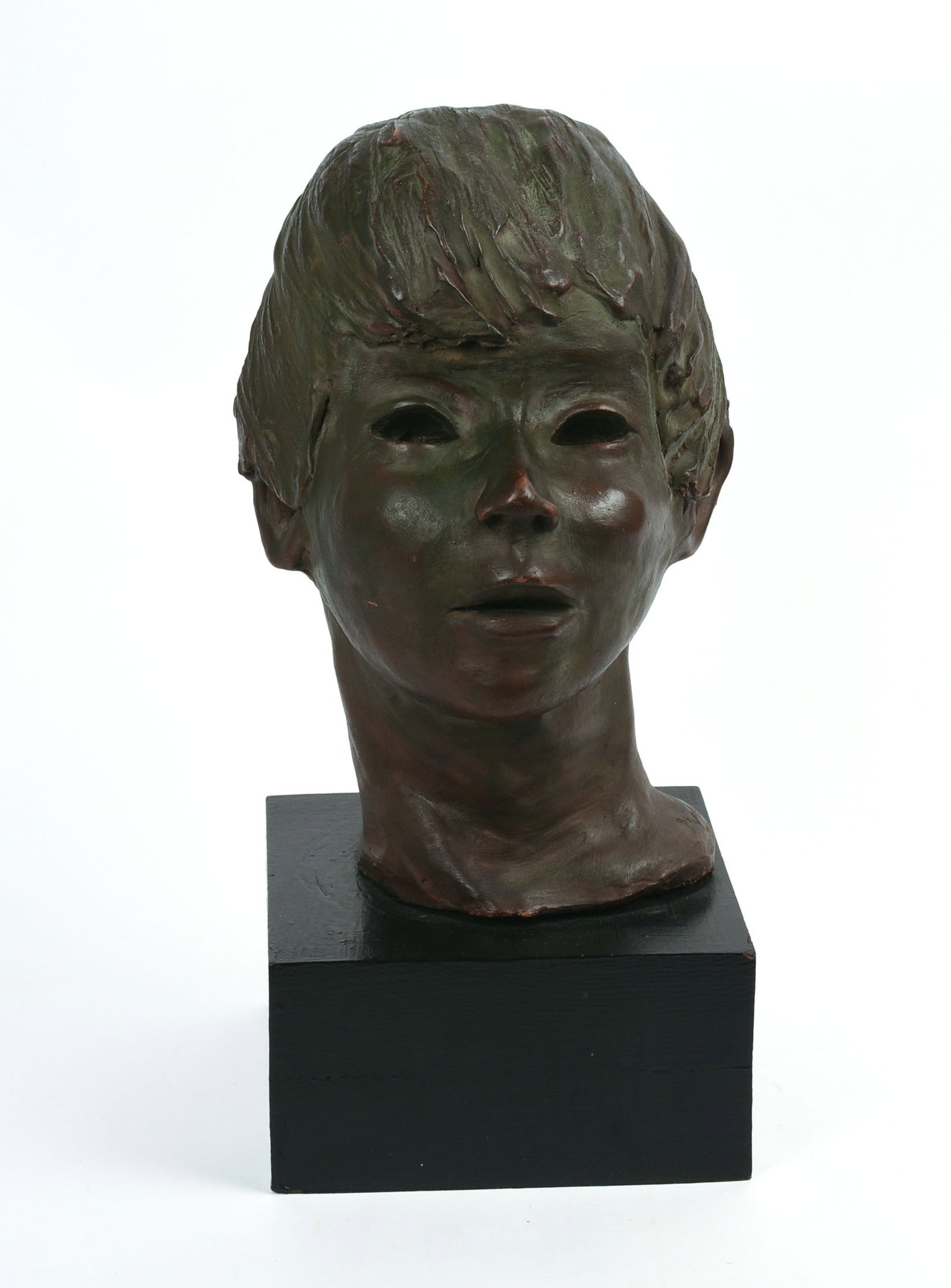Early 20th Century Sculptured Bust of a Young Woman on Stand.: Height 16 inches, width 7 inches, depth 7 inches.