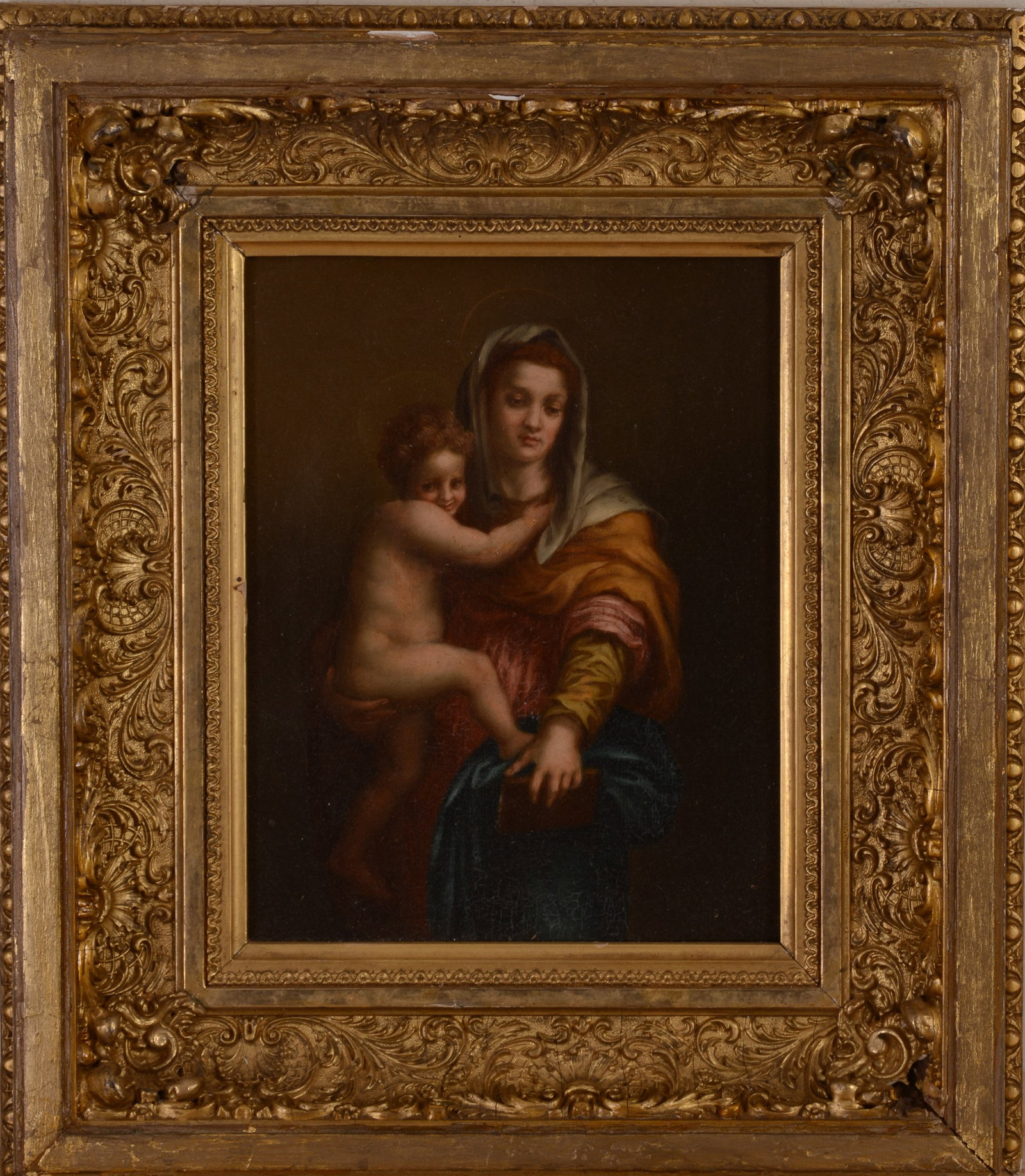 19th Century European School Portrait of Madonna and Child.: Oil on canvas, 9 x 7 inches. In a period gilt frame, 14.5 x 12 inches. Repaired tear to canvas.