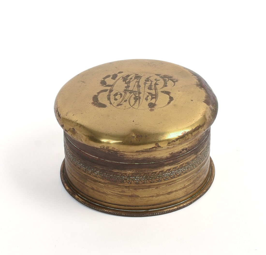 Soldier Made Brass Dresser Box.: With label stating 'Made by a patient at Harvard Unit Hospital, 1916, in Dammes-Garnier, France." Diameter 3.25 inches.