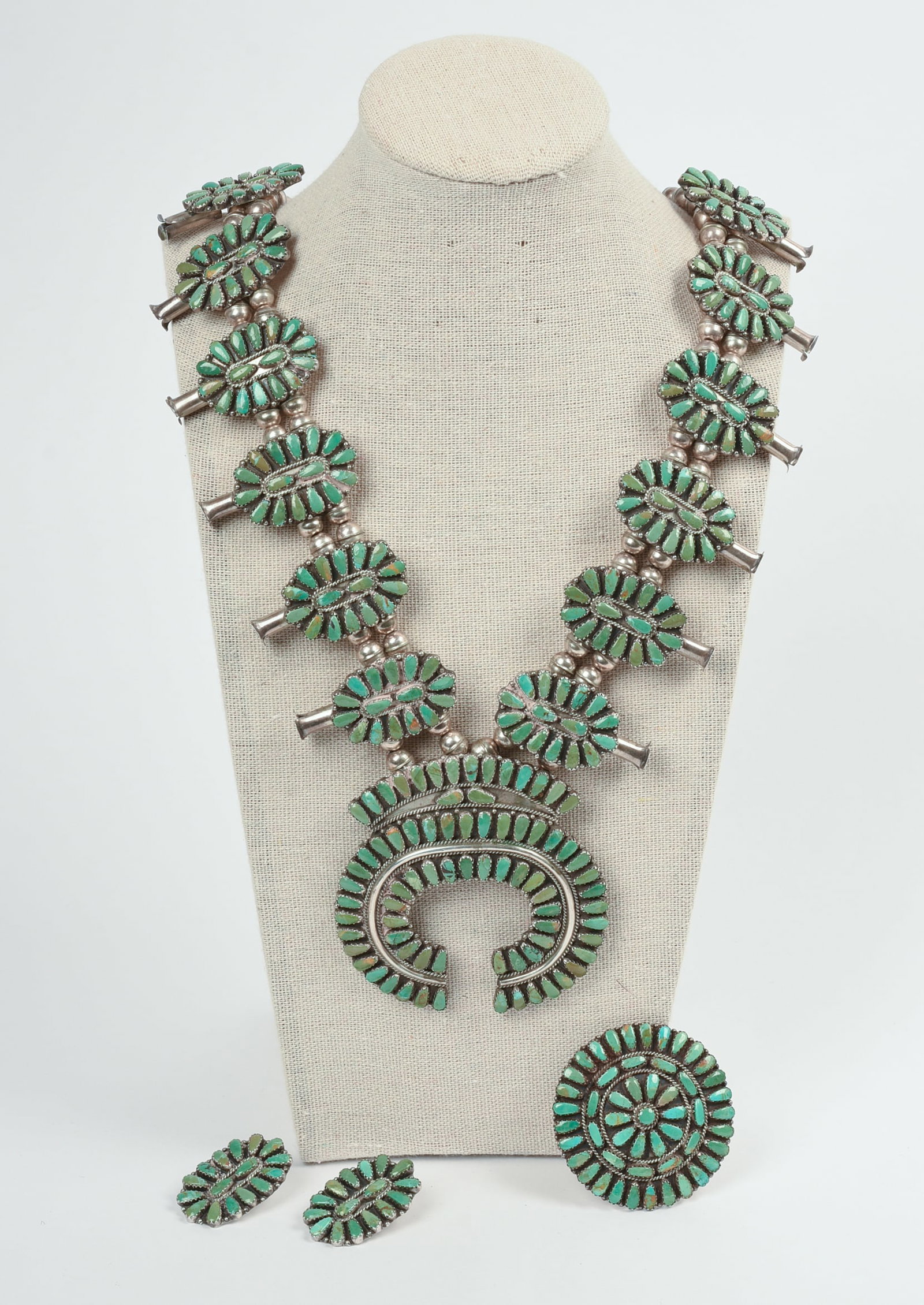 Larry Moses Begay Navajo Turquoise Squash Blossom Set.: Includes necklace, pendant 3 x 3 inches, a 2 inch brooch, and a pair of earrings, 1.25 x 0.75 inches. Necklace and brooch marked LMB, all marked sterling.