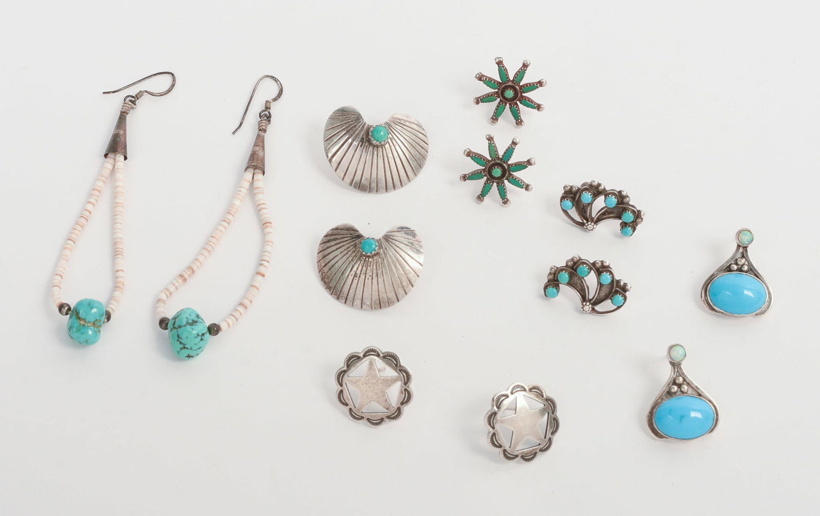 Six Pairs of Navajo Sterling Earrings.: Length of beaded and turquoise pair 2.5 inches. Unmarked.