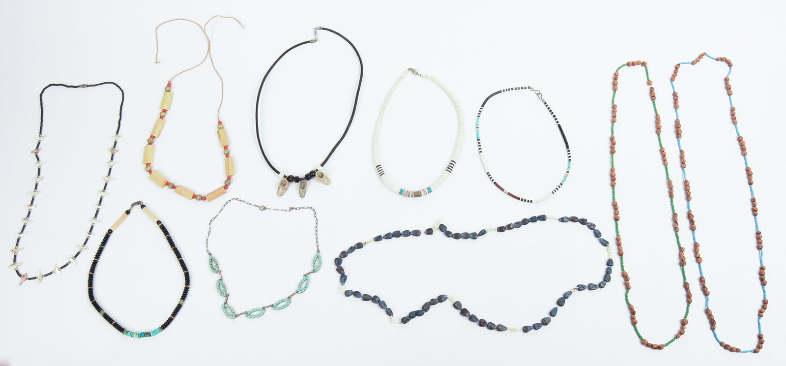 Ten Native American Beaded Necklaces.: Lengths 14 to 28 inches.