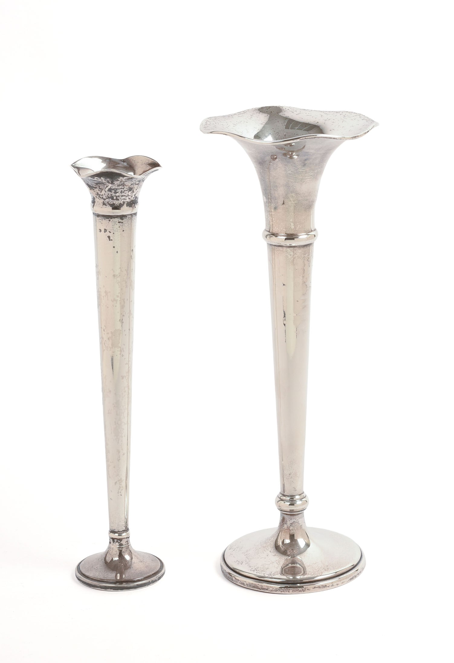 Two Weighted Sterling Trumpet Vases.: Black, Starr & Frost and B&M, heights 9.25 and 10 inches.