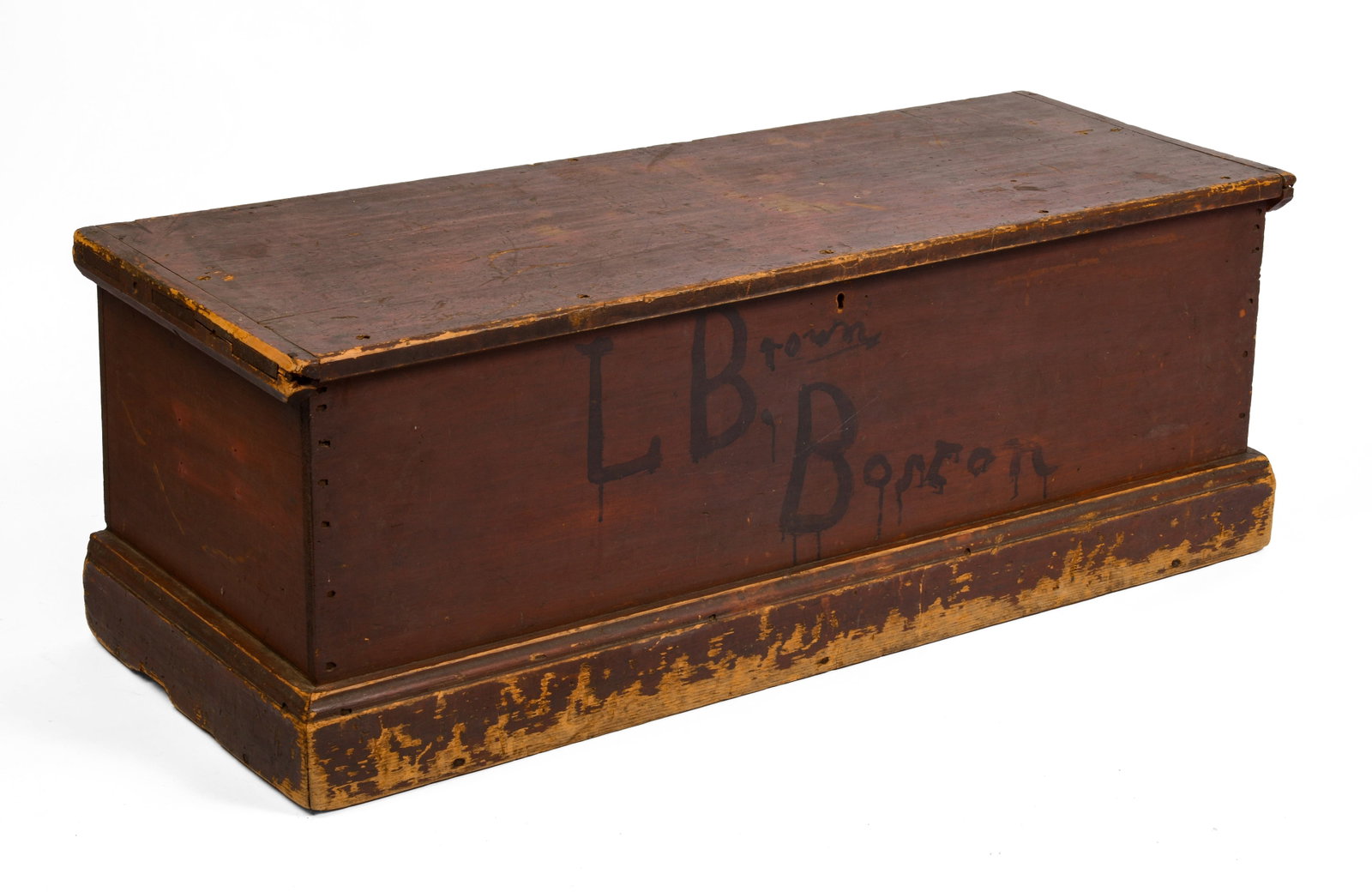 PINE BLANKET CHEST IN OLD RED WITH BOSTON ADDRESS.: Height 15.5 inches, length 43.5 inches, depth 15.5 inches. The front inscribed "L Brown, Boston."