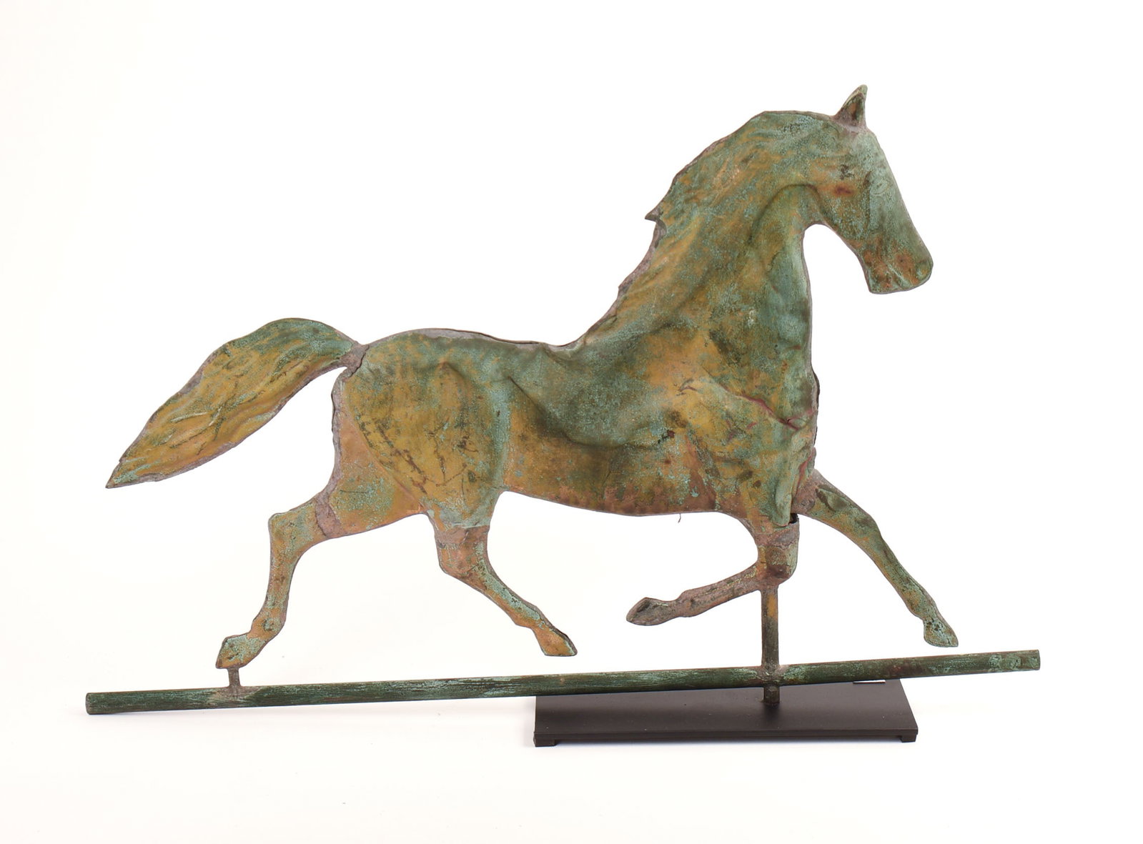 19TH CENTURY COPPER TROTTING HORSE WEATHERVANE.: Includes stand. Possibly Harris & Co. or Cushing & White. Length 28 inches. Dented, can be restored by a qualified professional.