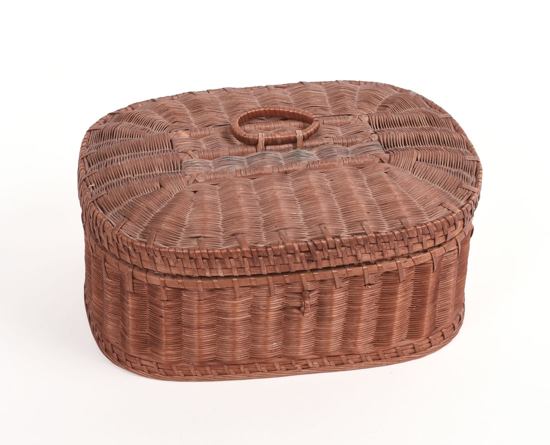 EARLY WOVEN SWEETGRASS SEWING BASKET.: With strawberry and apple pincushions. 3.5 x 8 x 6 inches. 