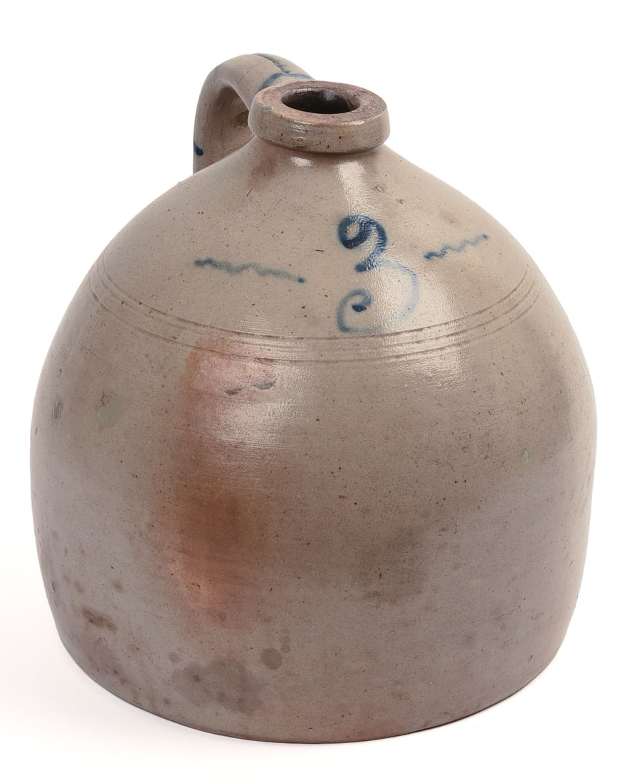 STONEWARE THREE-GALLON JUG.: Cobalt decorated handle, 19th century. Height 12.5 inches. Good condition.